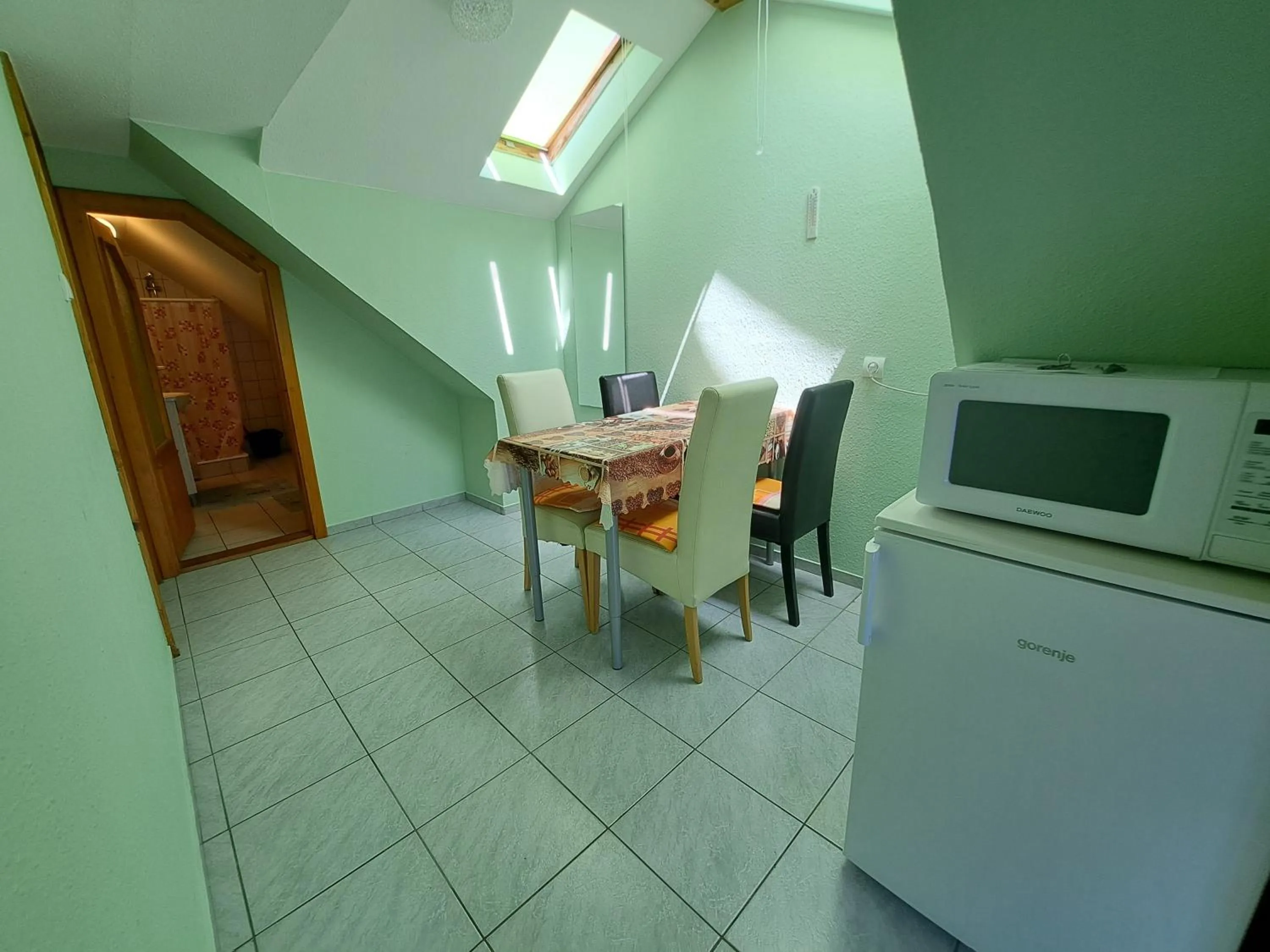 Dining area in Pink Tulip Apartment House