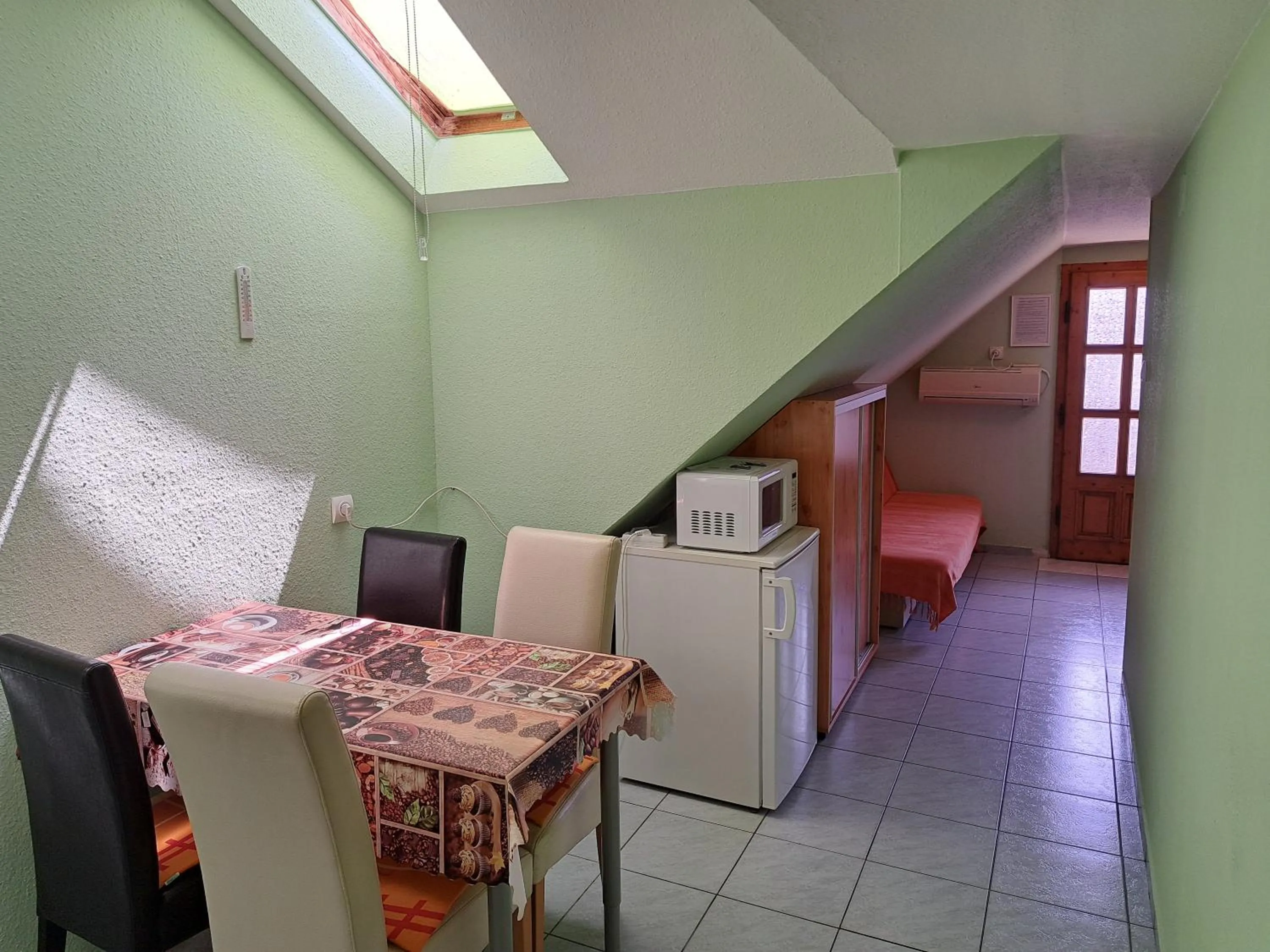 Dining area in Pink Tulip Apartment House