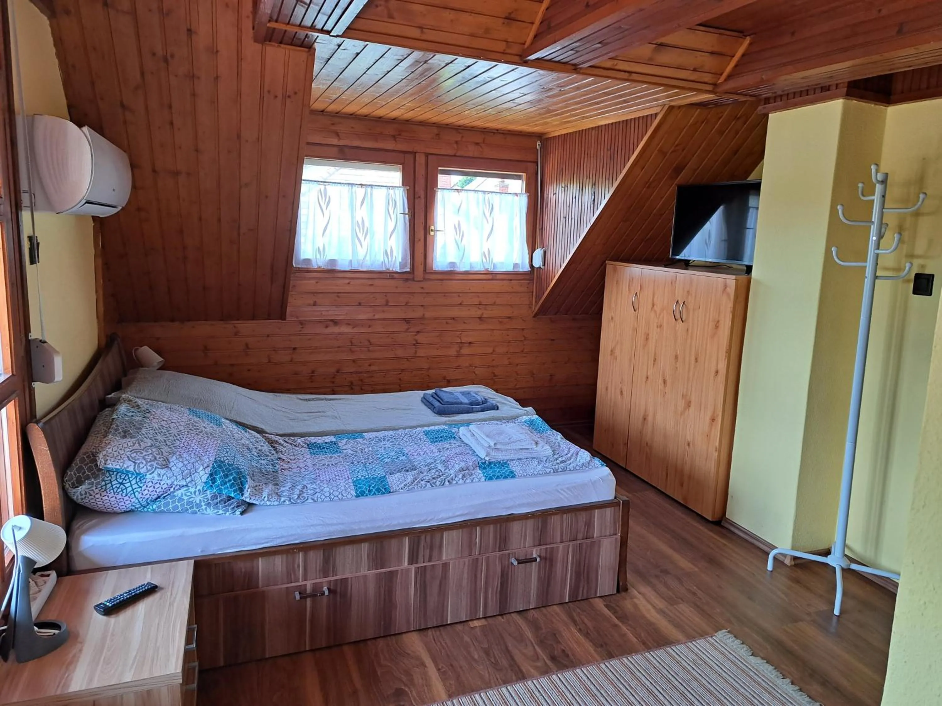 Bedroom, Bed in Pink Tulip Apartment House