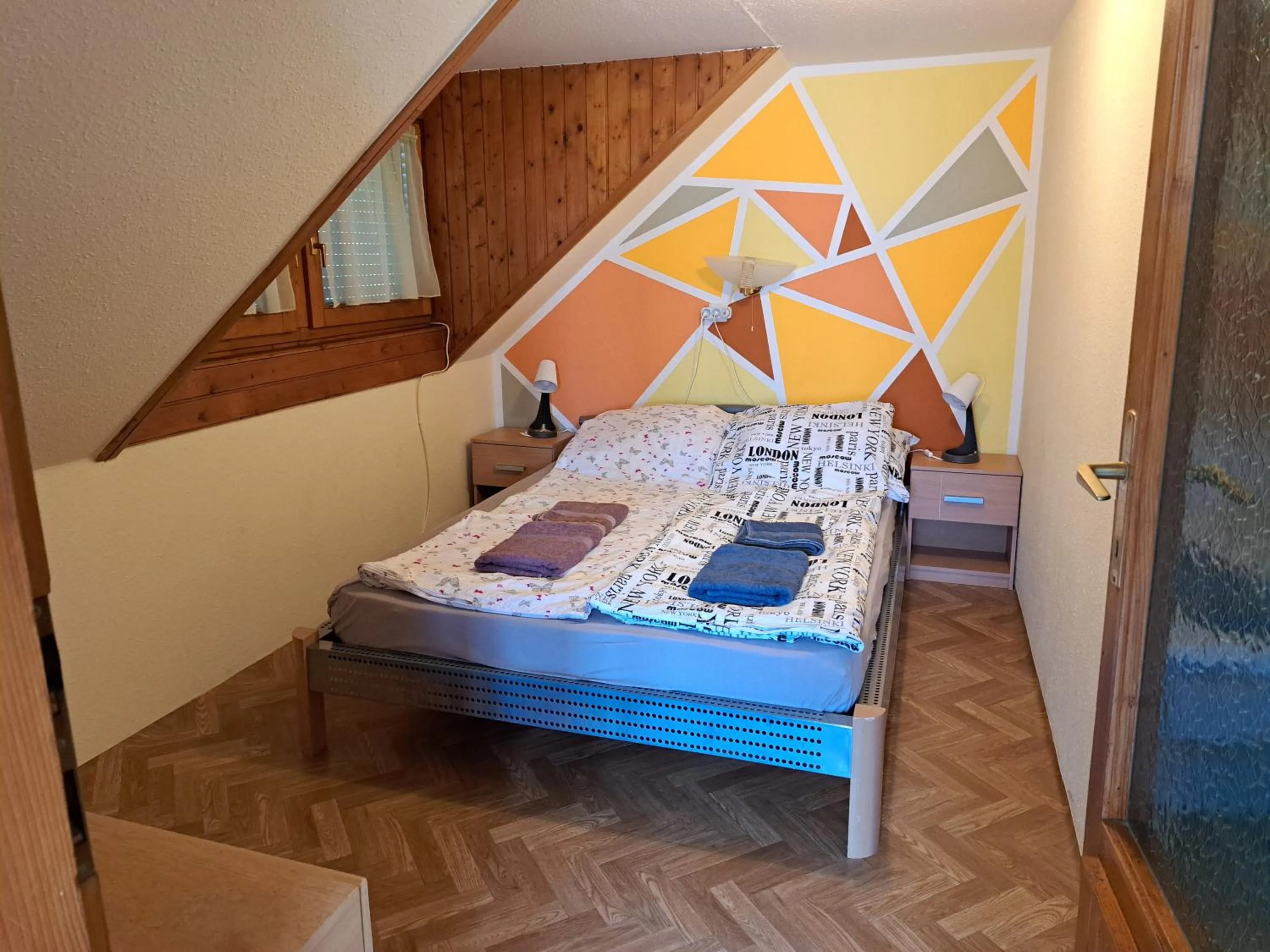 Bedroom, Bed in Pink Tulip Apartment House