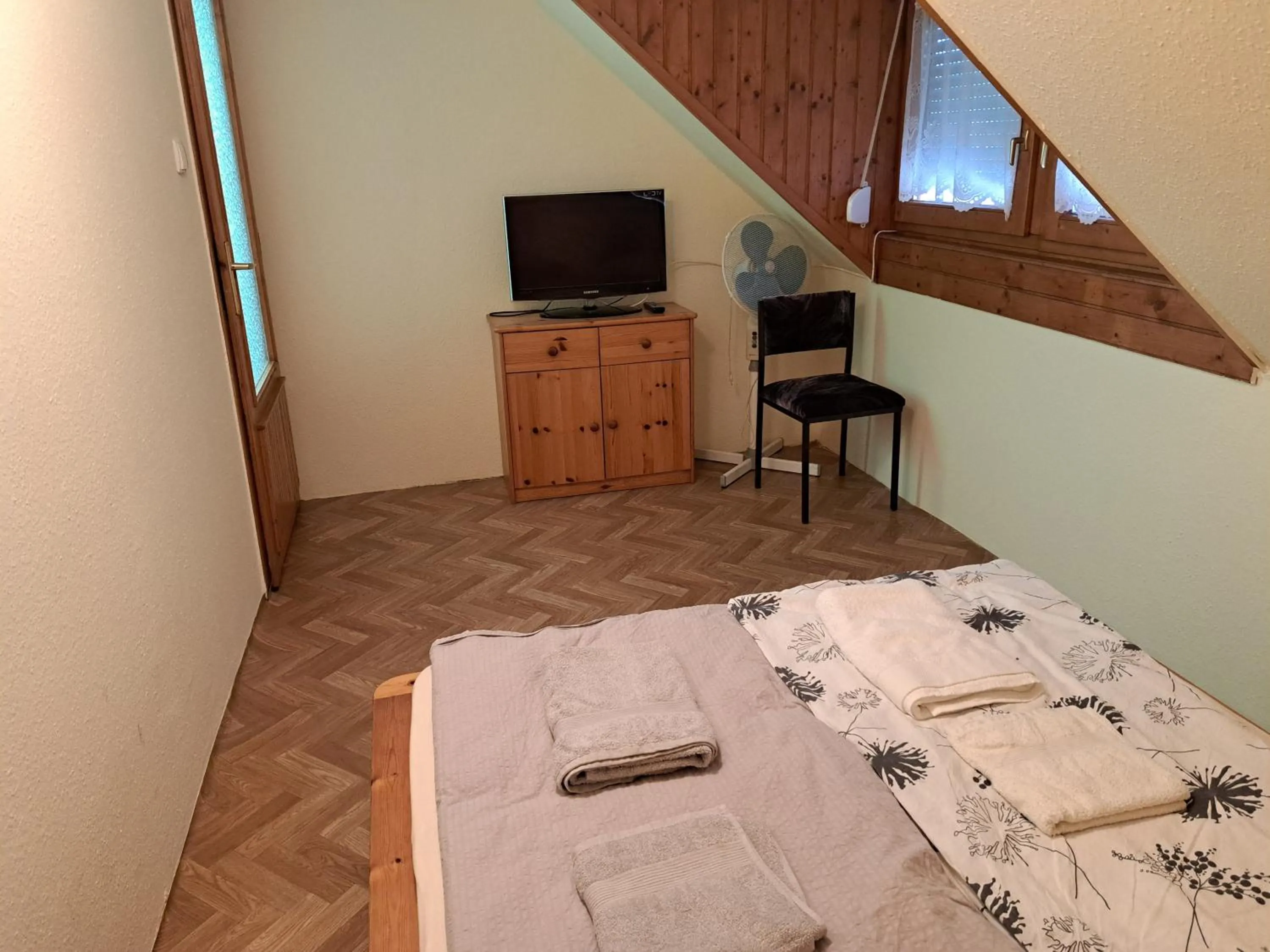 Bedroom, Bed in Pink Tulip Apartment House