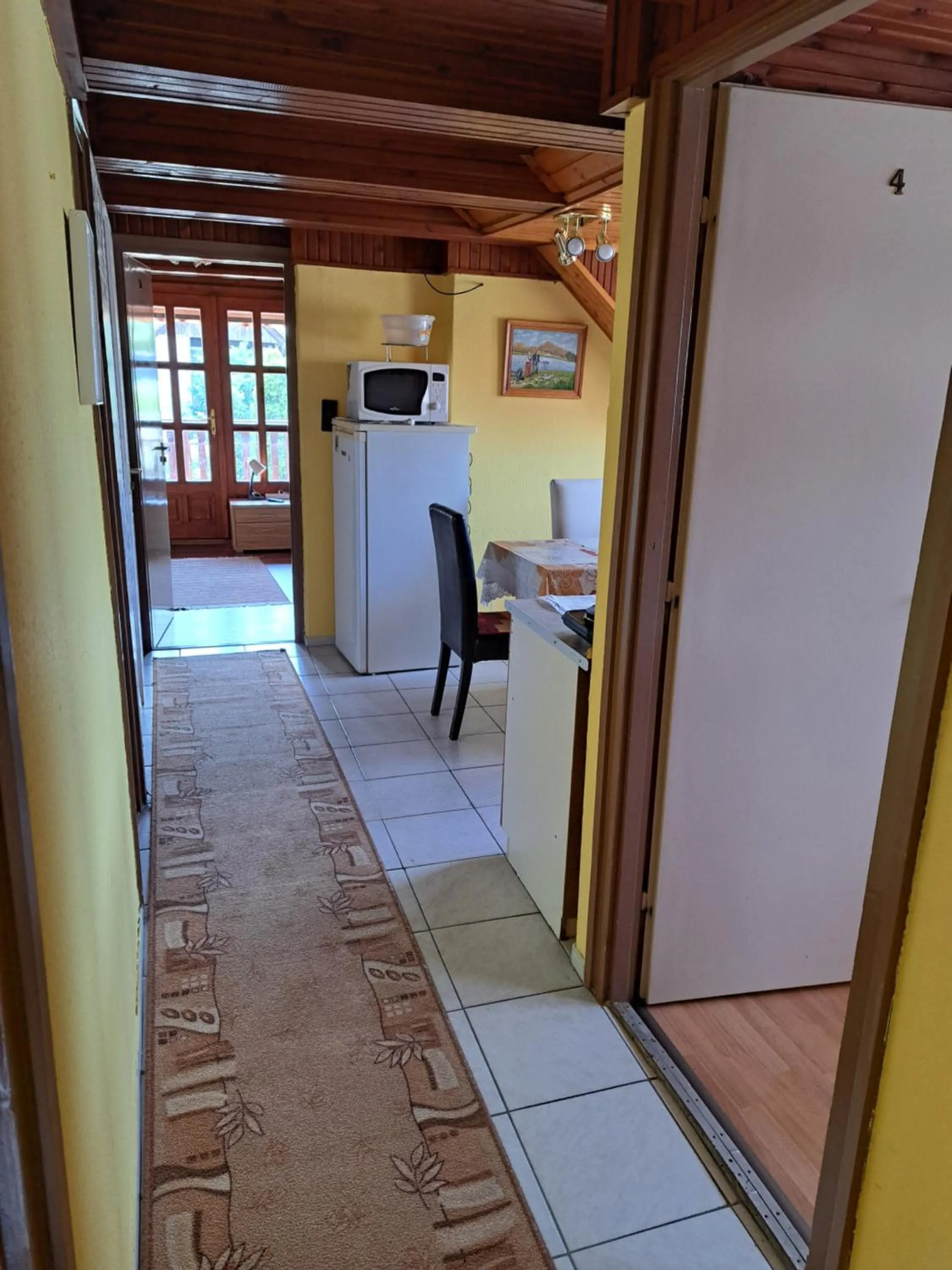 Kitchen or kitchenette in Pink Tulip Apartment House