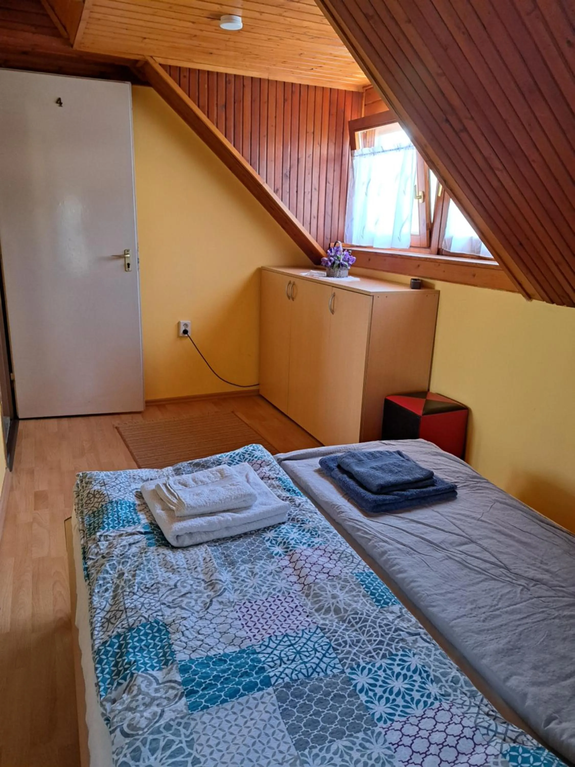 Bedroom, Bed in Pink Tulip Apartment House