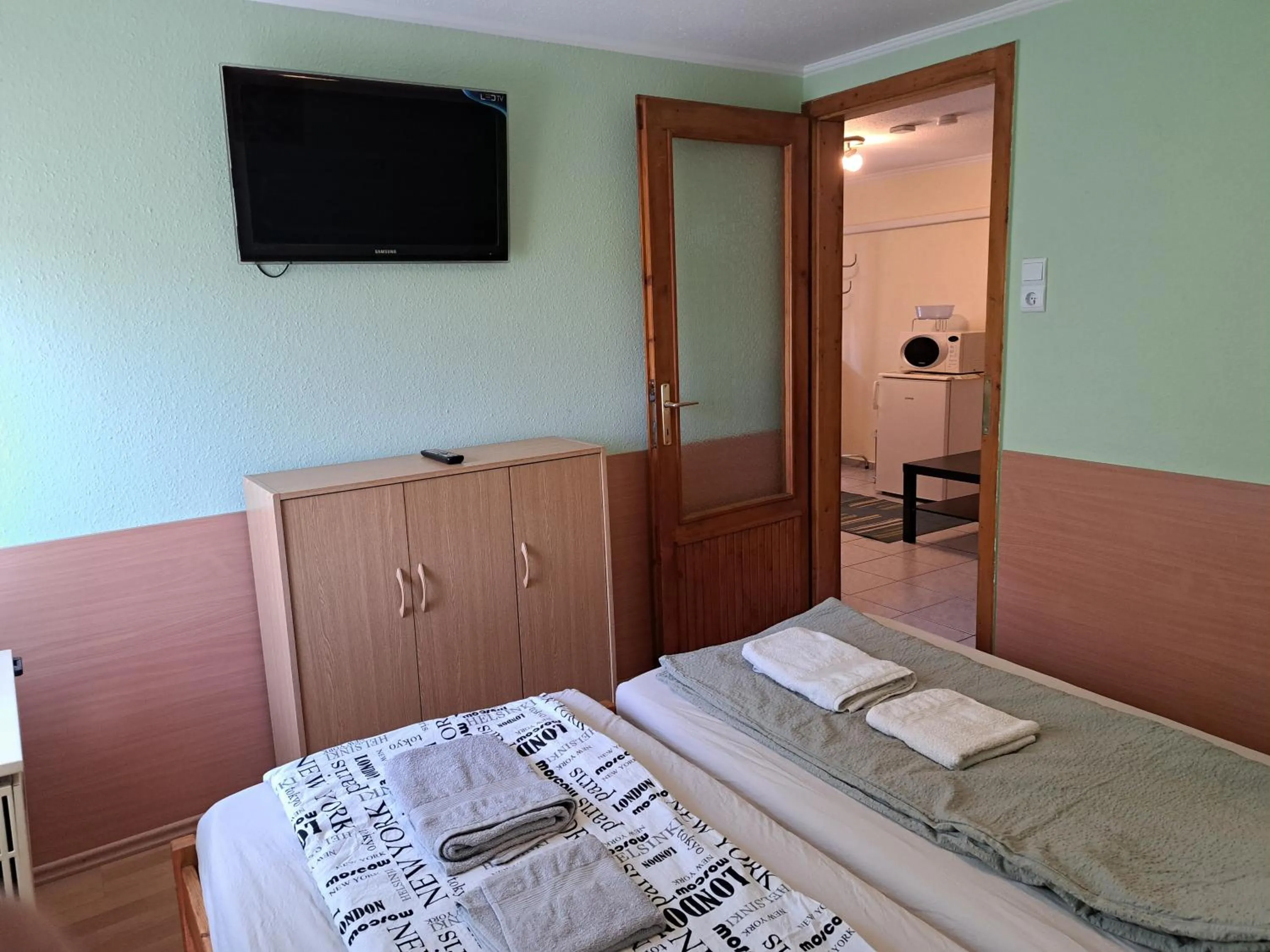 Bedroom, Bed in Pink Tulip Apartment House