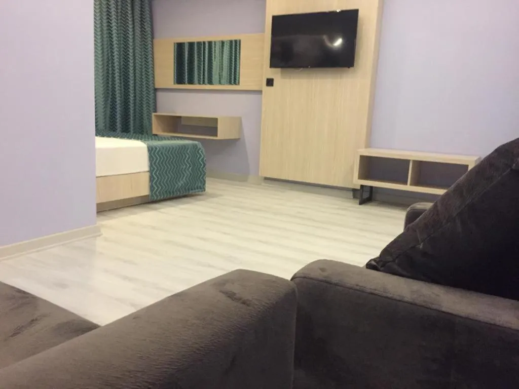 Communal lounge/ TV room, Bed in Livaneli Boutique Otel