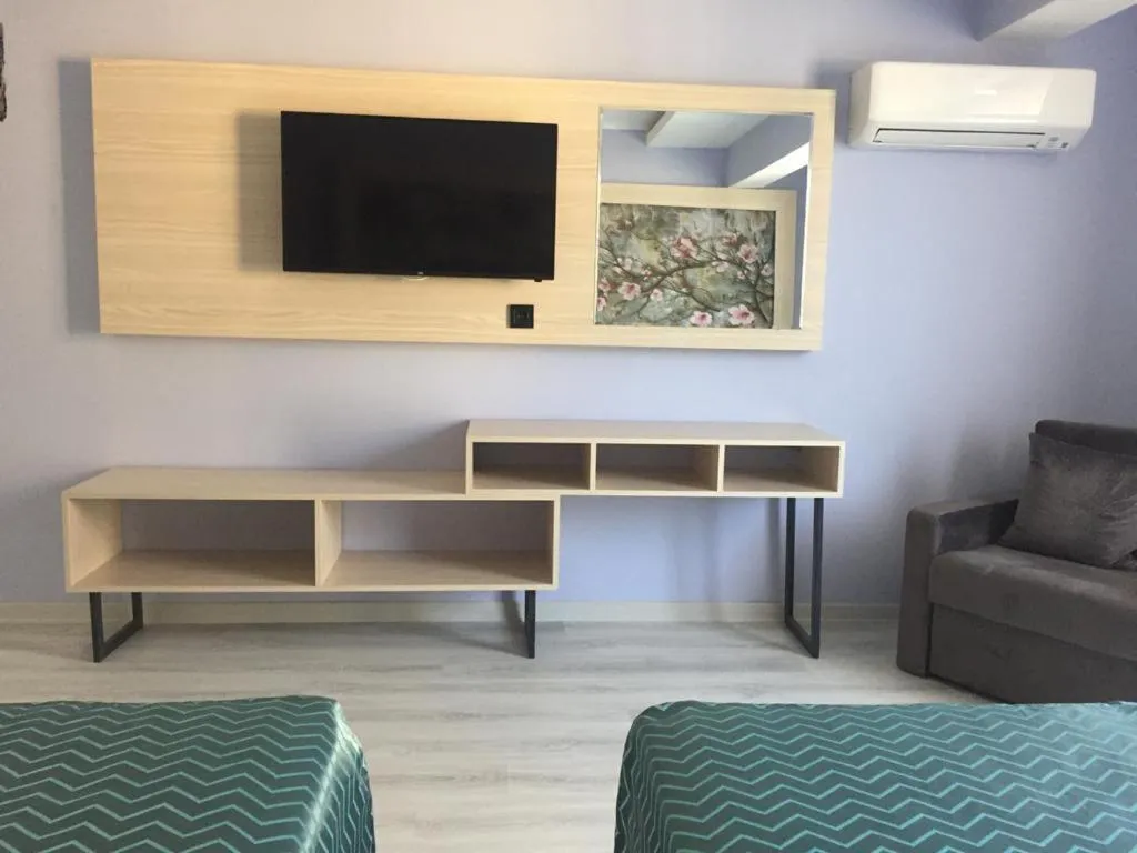 Communal lounge/ TV room in Livaneli Boutique Otel