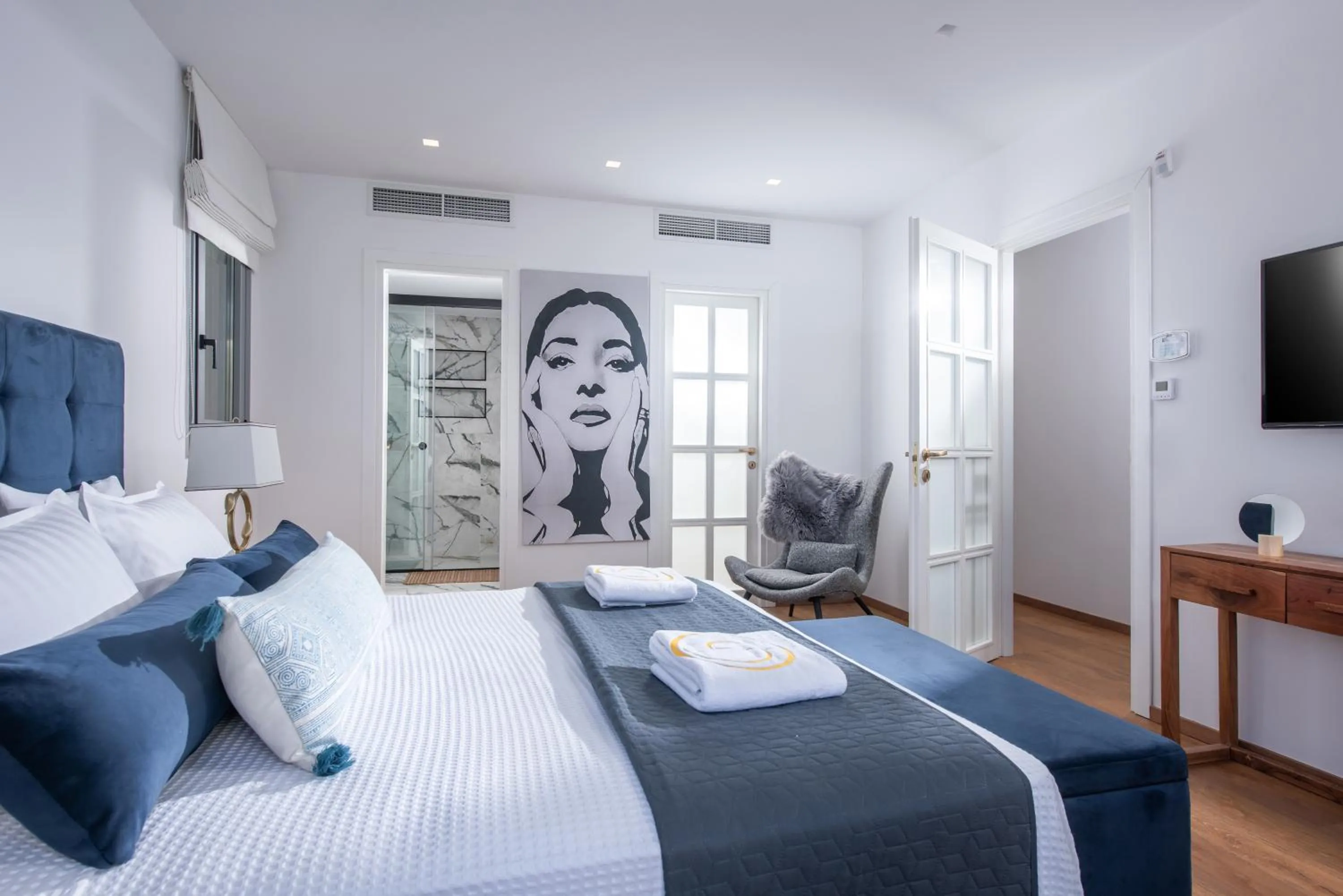 Bedroom in Opsis Luxury Villa with swimming pool