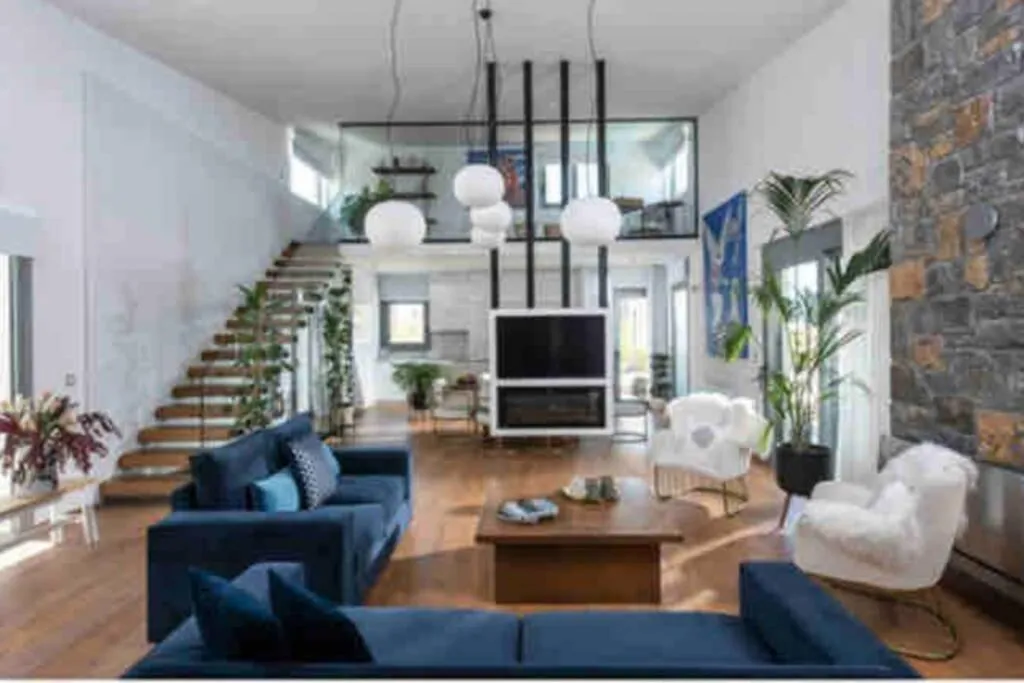 Seating area in Opsis Luxury Villa with swimming pool