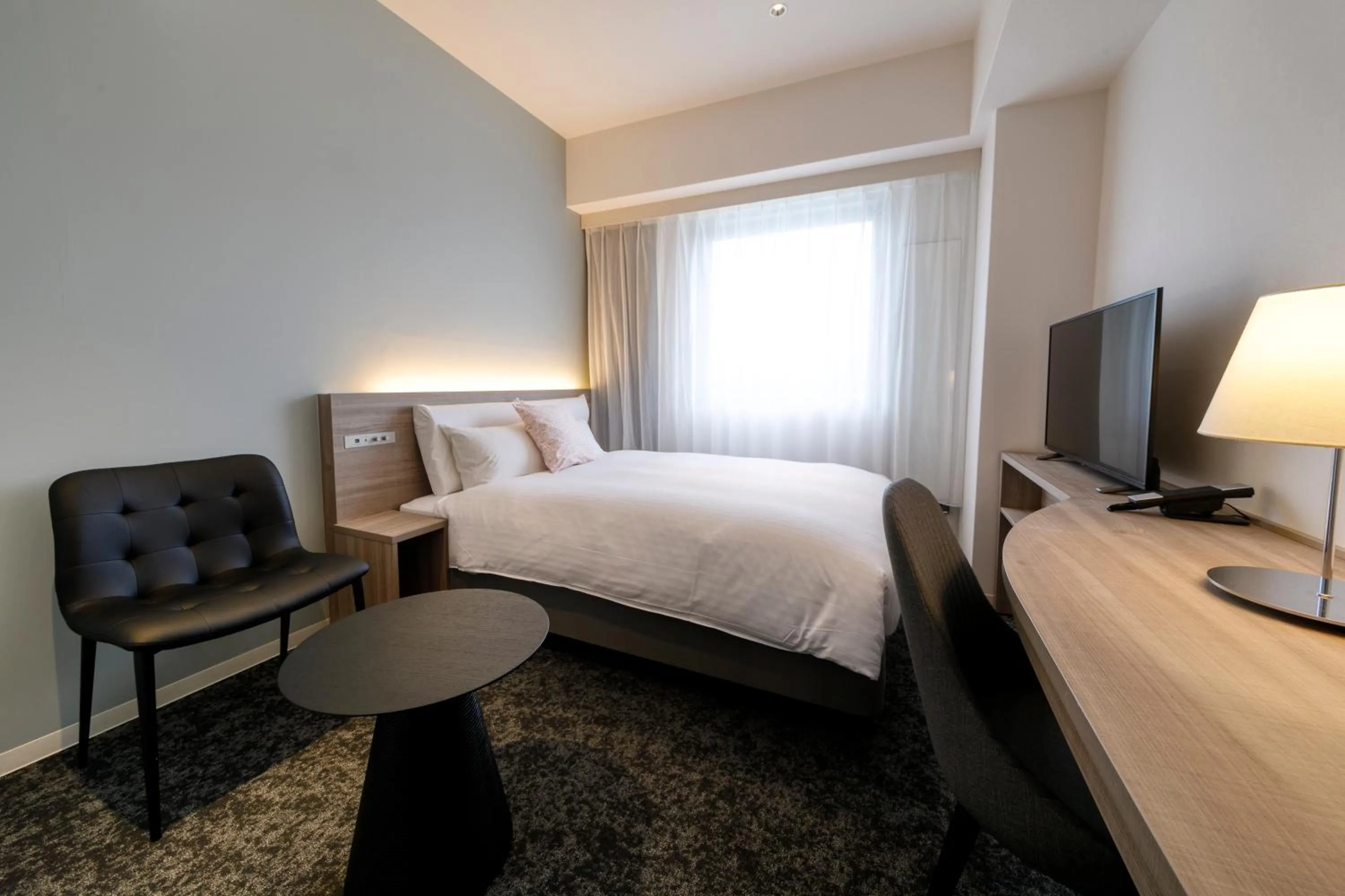 Photo of the whole room, Bed in Glocal Hotel Itoshima