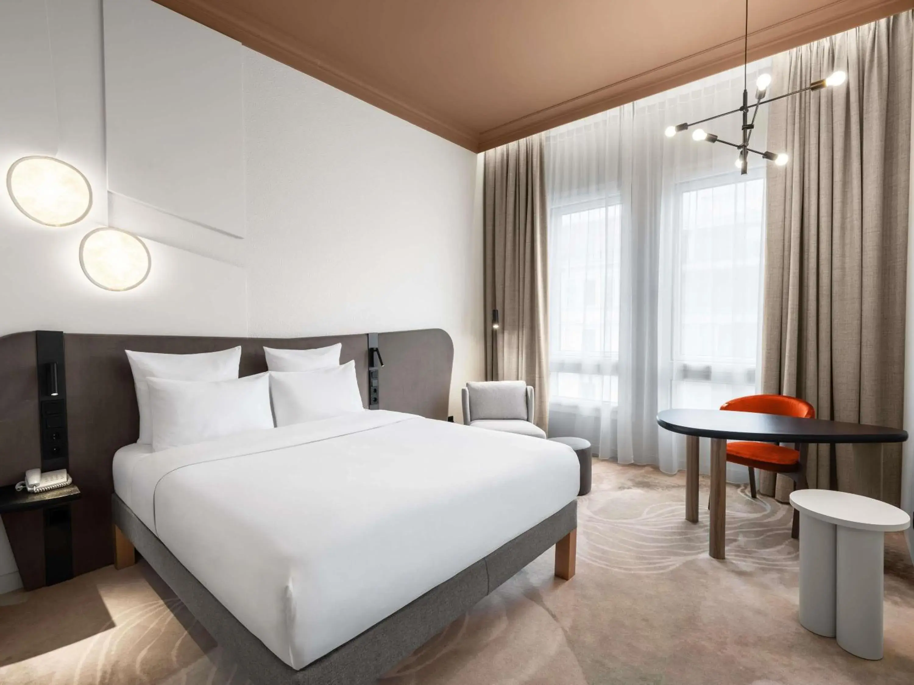 Bedroom, Bed in Mövenpick Hotel Budapest Centre Bedroom, Bed in Mövenpick Hotel Budapest Centre