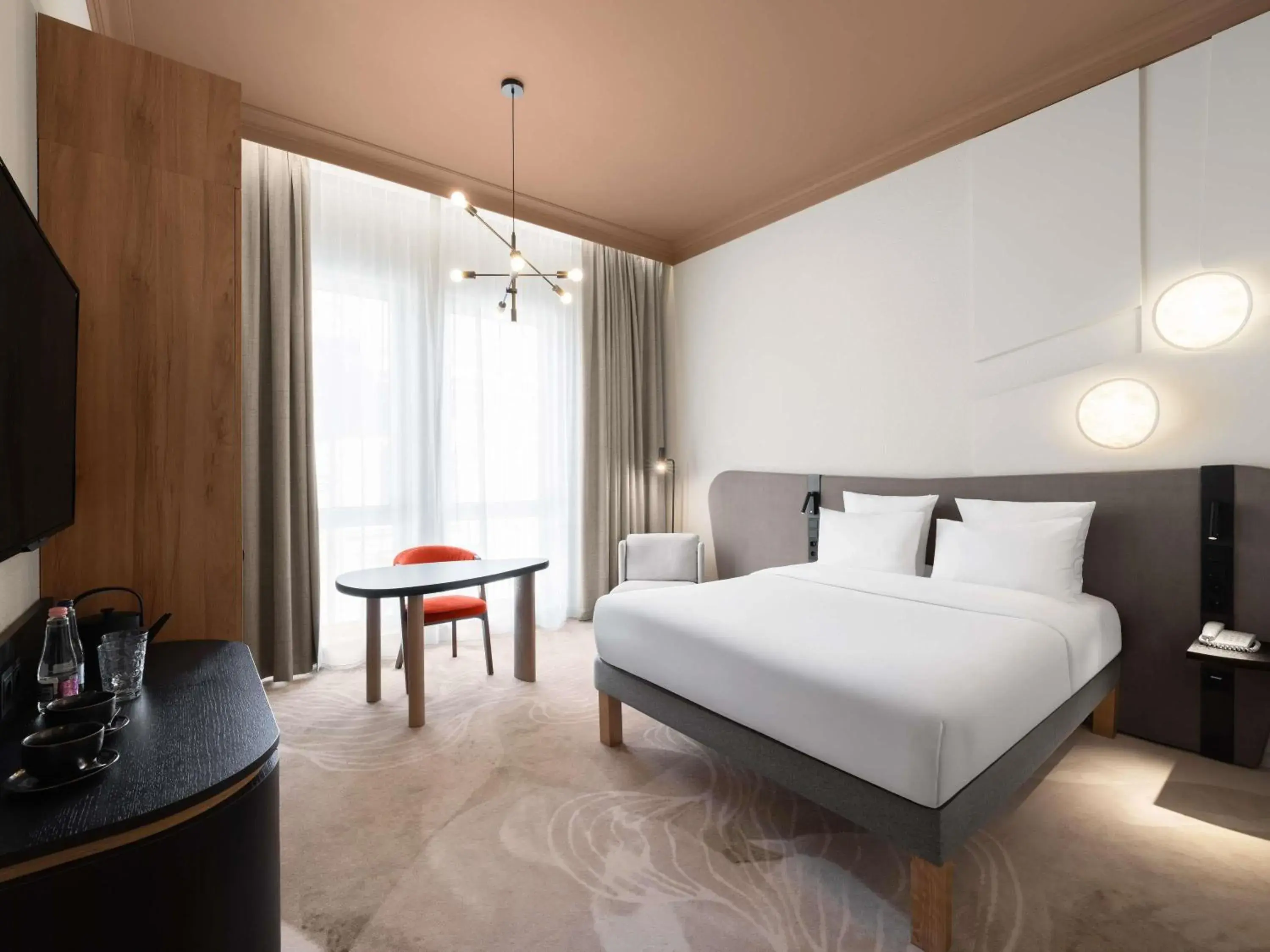 Bedroom, Bed in Mövenpick Hotel Budapest Centre Bedroom, Bed in Mövenpick Hotel Budapest Centre