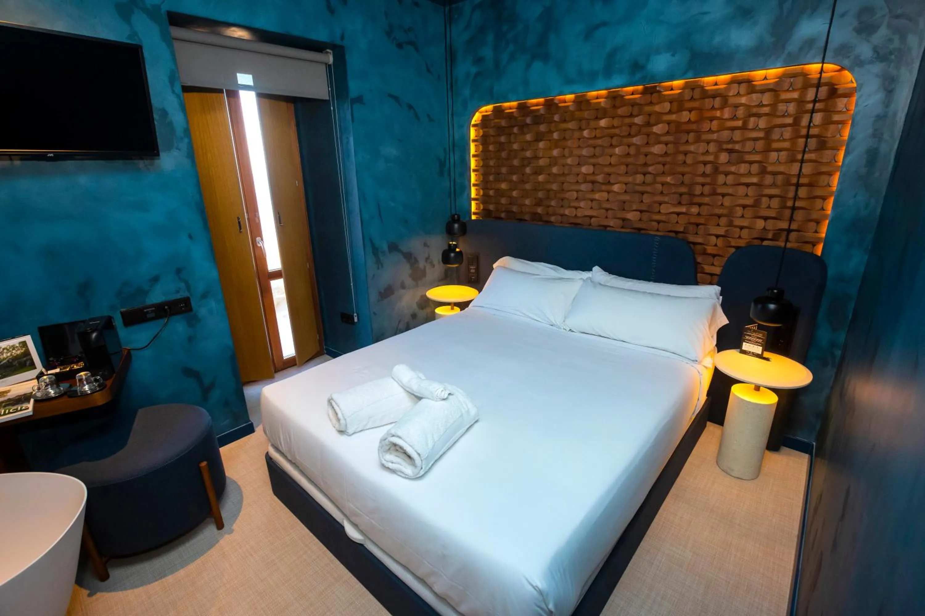 Photo of the whole room, Bed in Hotel Faro Lariño