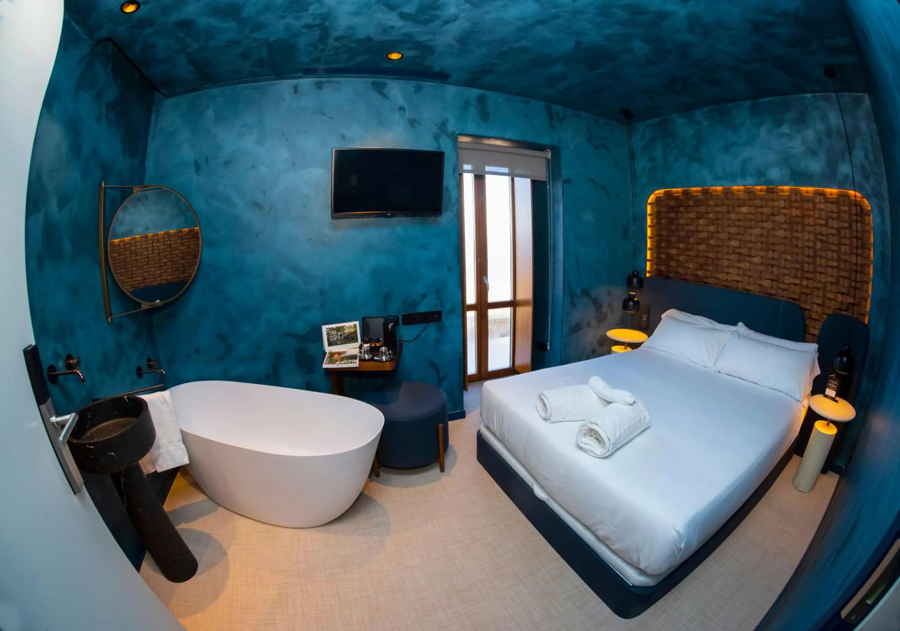 Bed in Hotel Faro Lariño