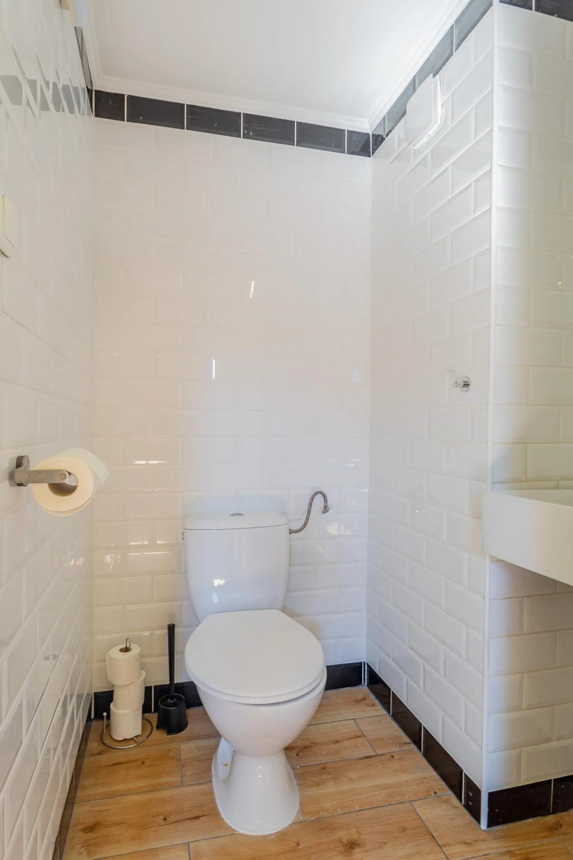 Toilet in Triple M Hotel