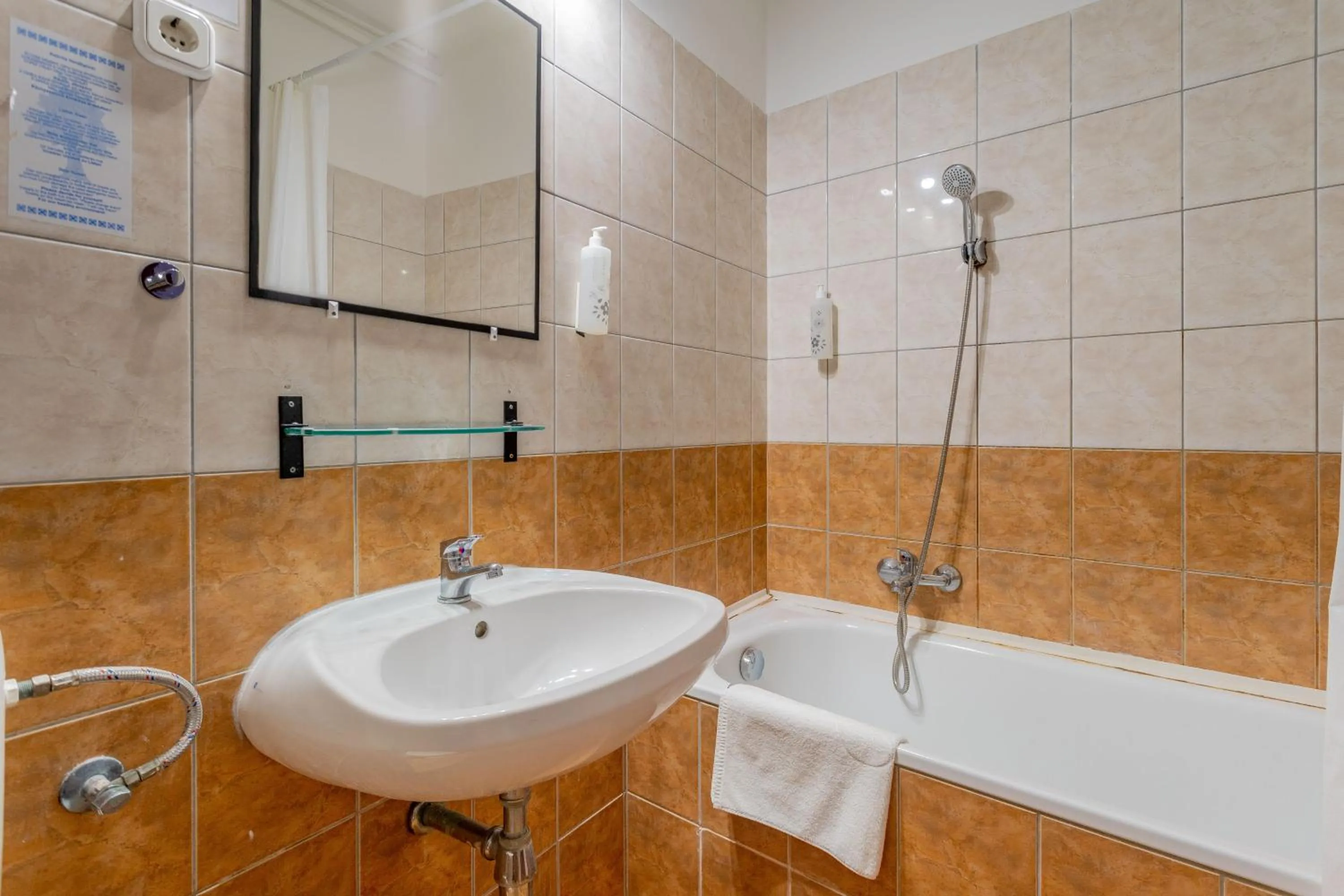 Toilet in Triple M Hotel