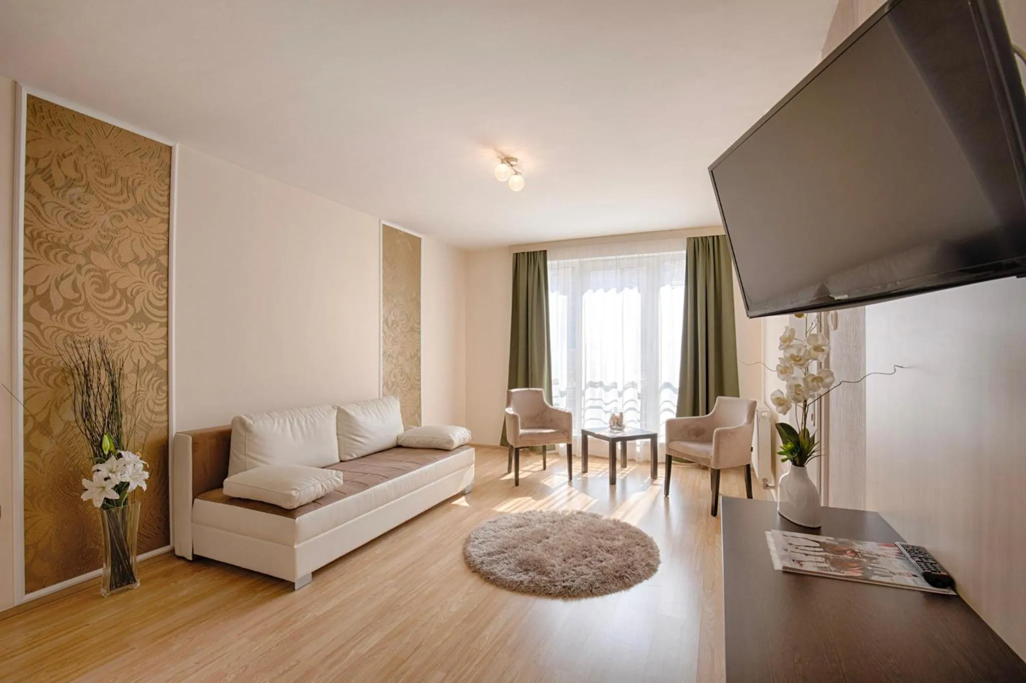 Living room in Triple M Hotel