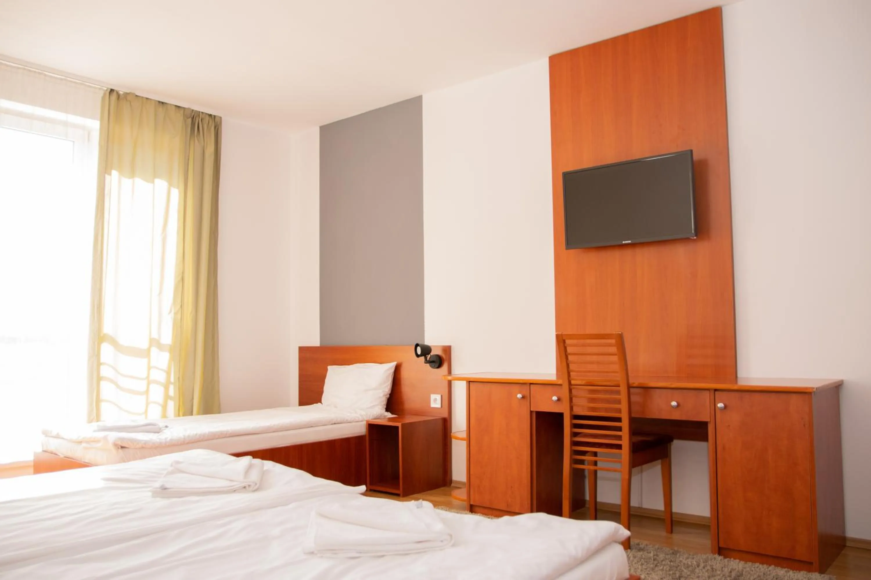 Bedroom, Bed in Triple M Hotel