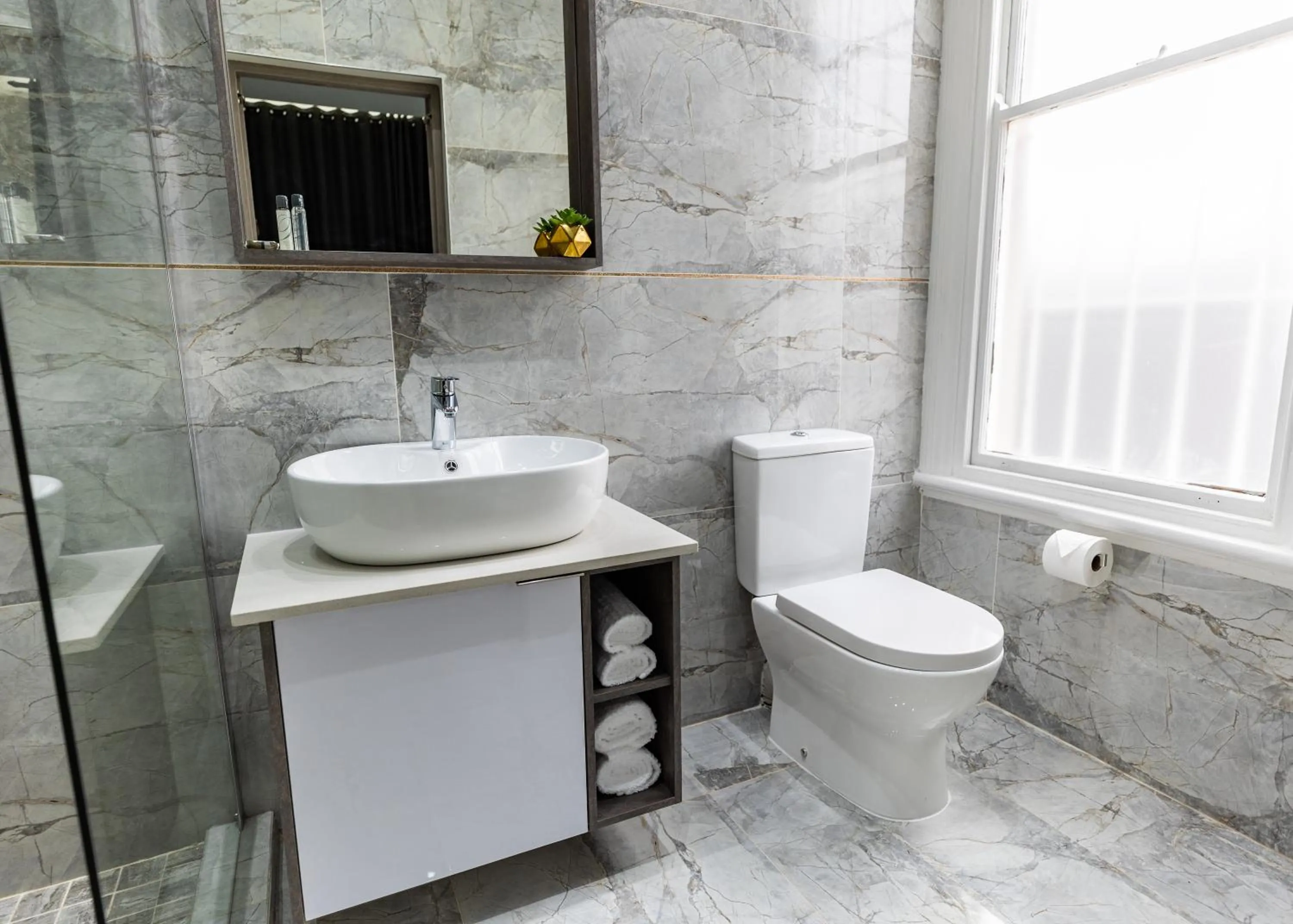 Bathroom in Luxe Suites Boutique Hotel