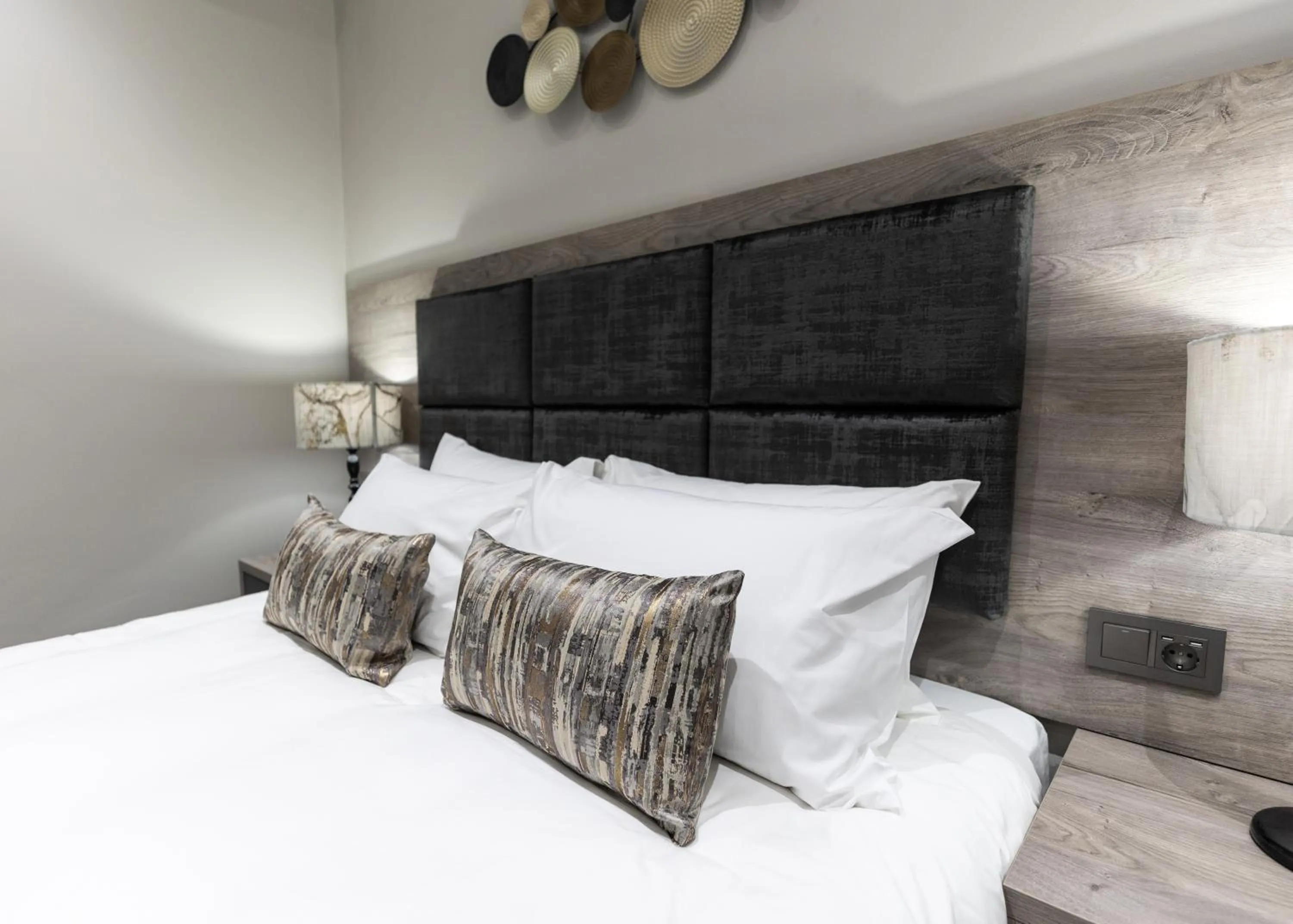 Bed in Luxe Suites Boutique Hotel