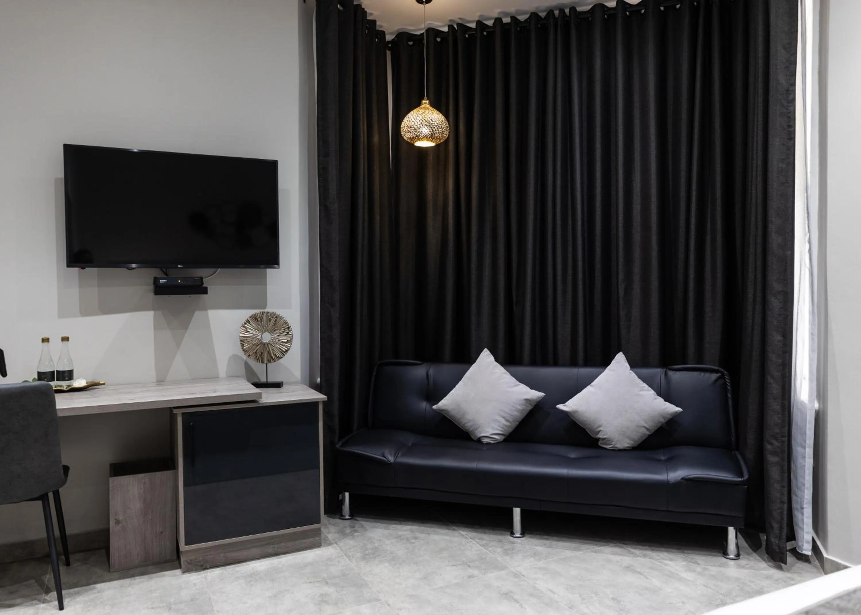 Bedroom in Luxe Suites Boutique Hotel