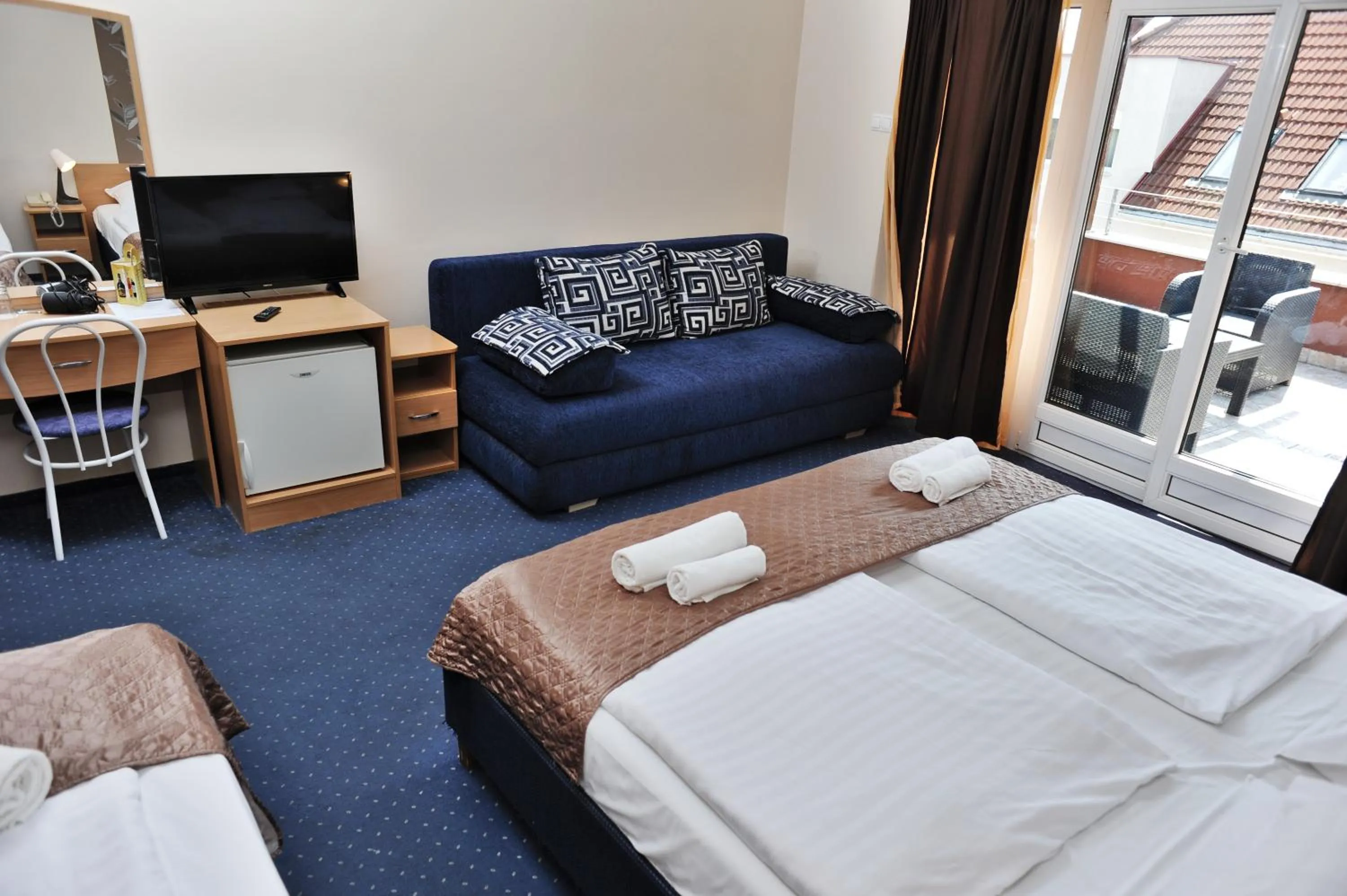 TV/Entertainment Center in Hotel Papillon