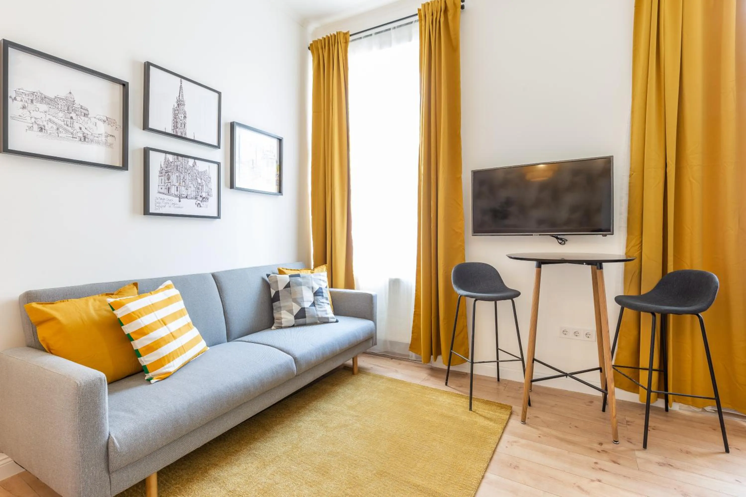 Communal lounge/ TV room in A13- Boutique Apartments, Best Location, by BQA