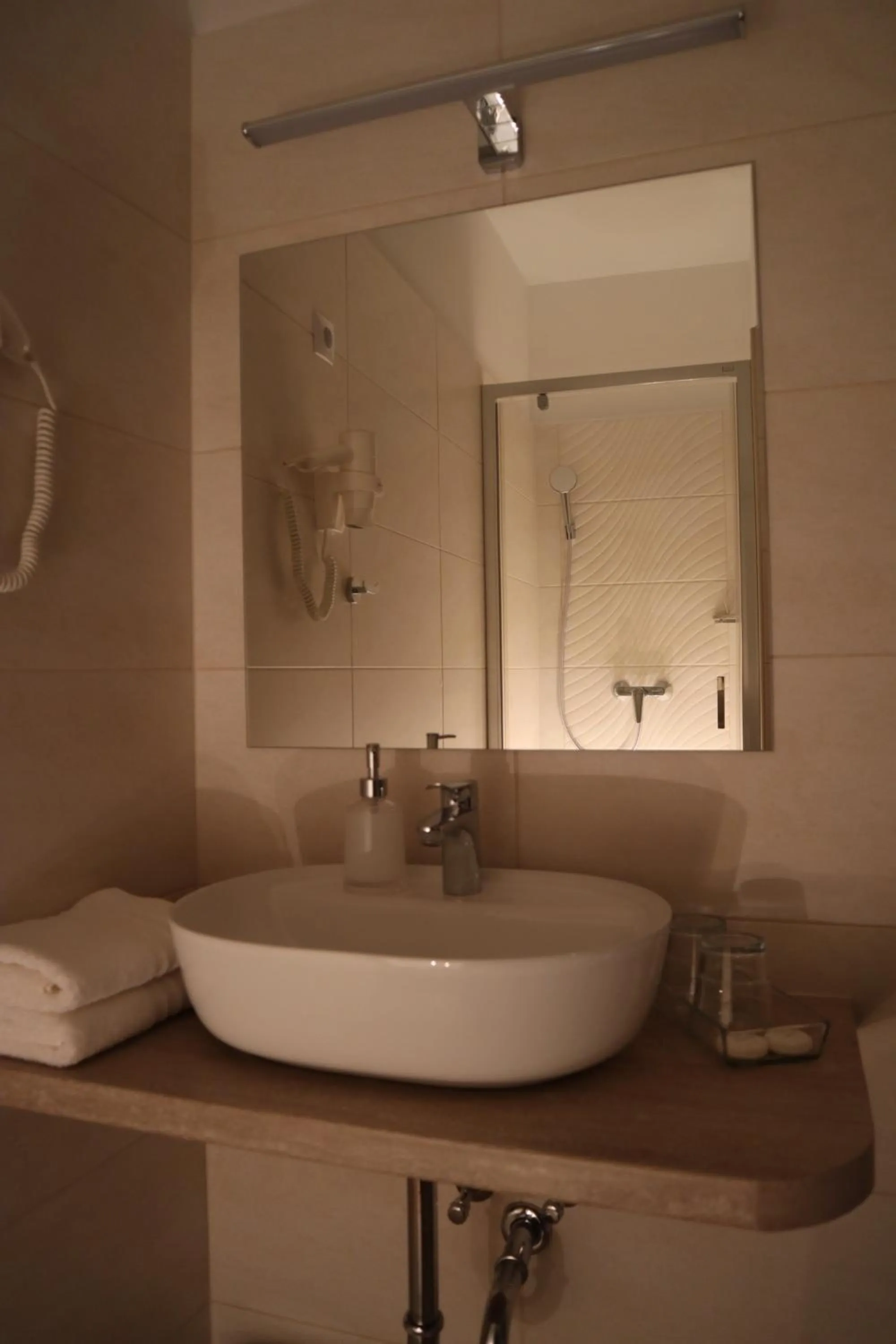 Bathroom in Alfa Hotel