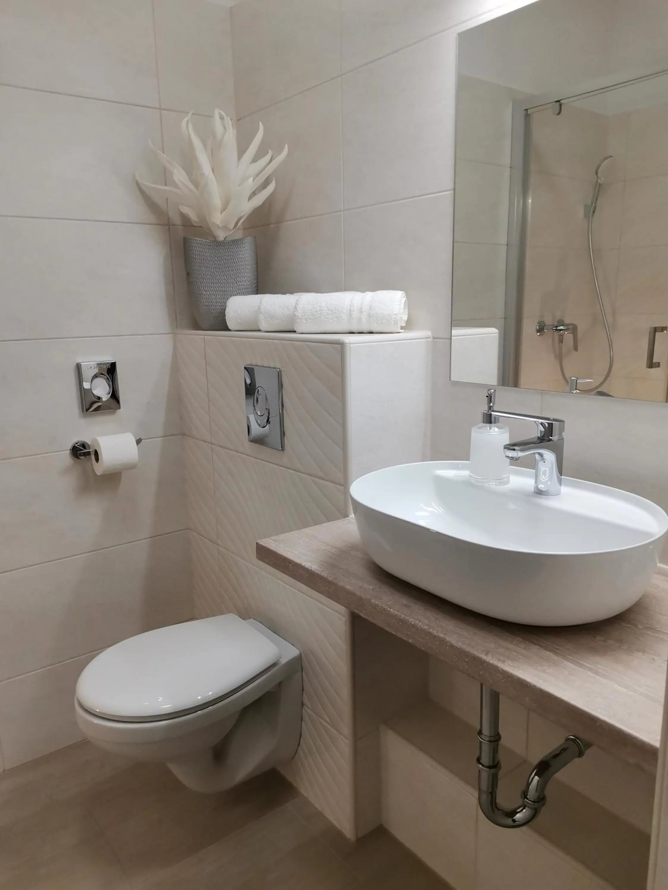 Bathroom in Alfa Hotel