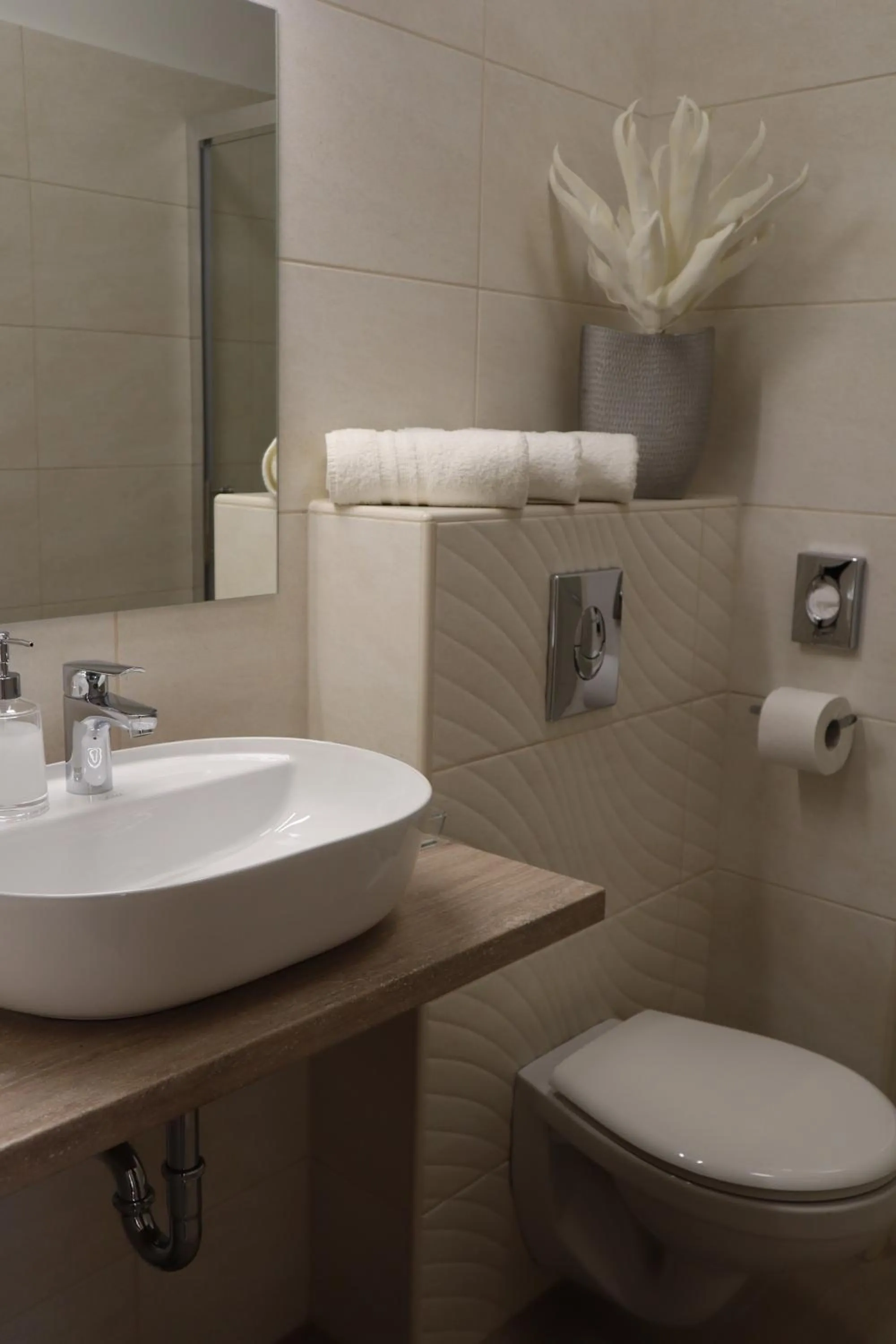 Bathroom in Alfa Hotel