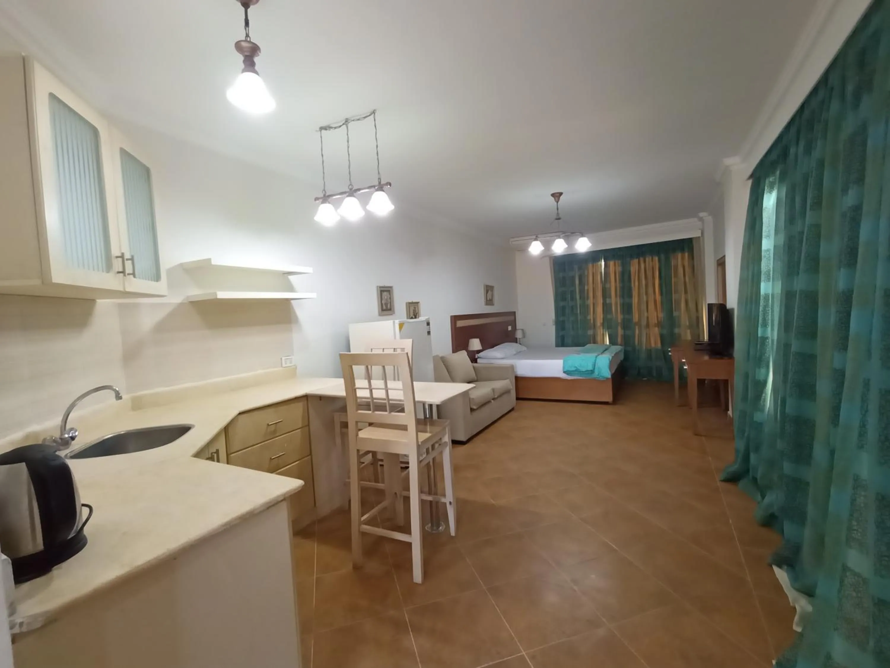 Kitchen or kitchenette, Bed in Oasis marsa alam