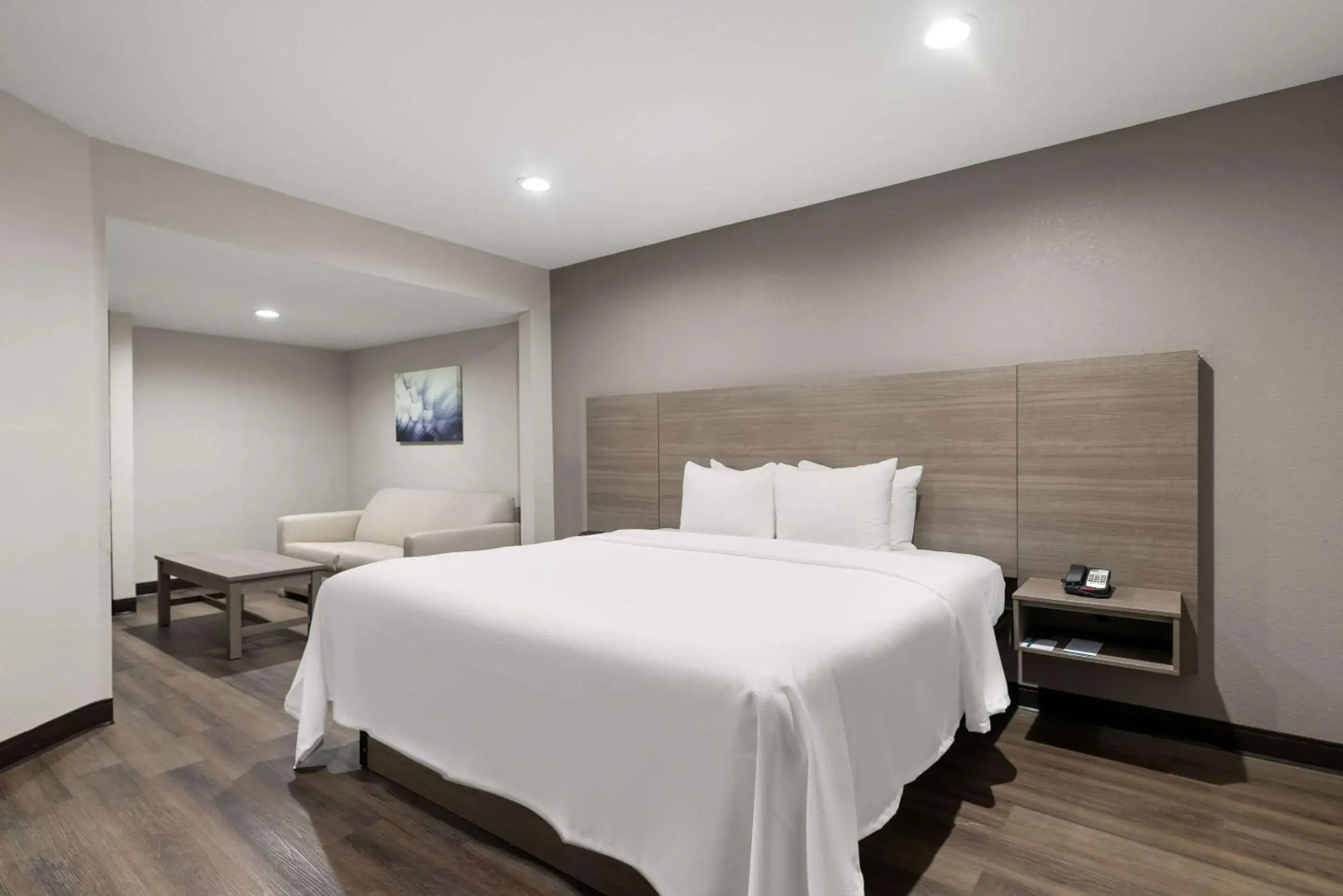 Bedroom, Bed in Quality Suites Wildwood - The Villages Bedroom, Bed in Quality Suites Wildwood - The Villages