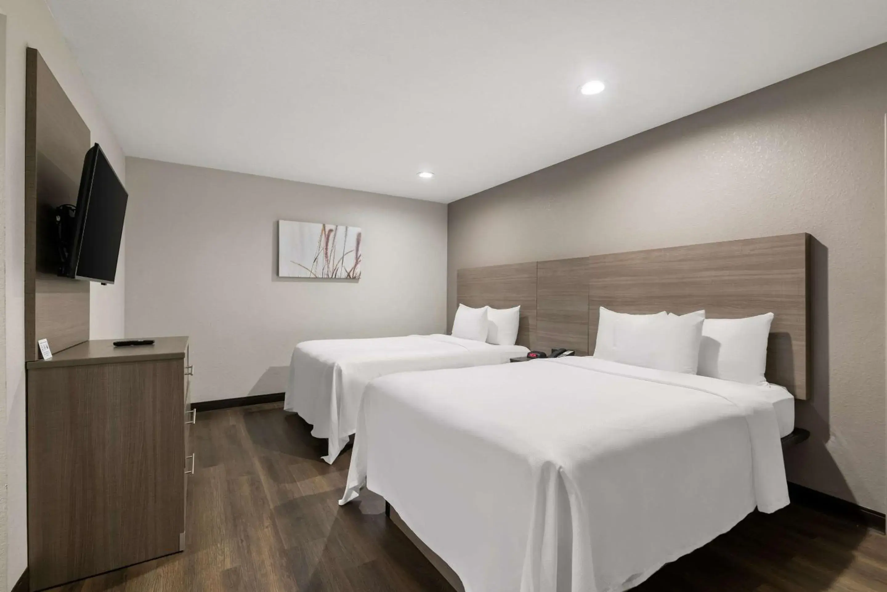 Bedroom, Bed in Quality Suites Wildwood - The Villages Bedroom, Bed in Quality Suites Wildwood - The Villages