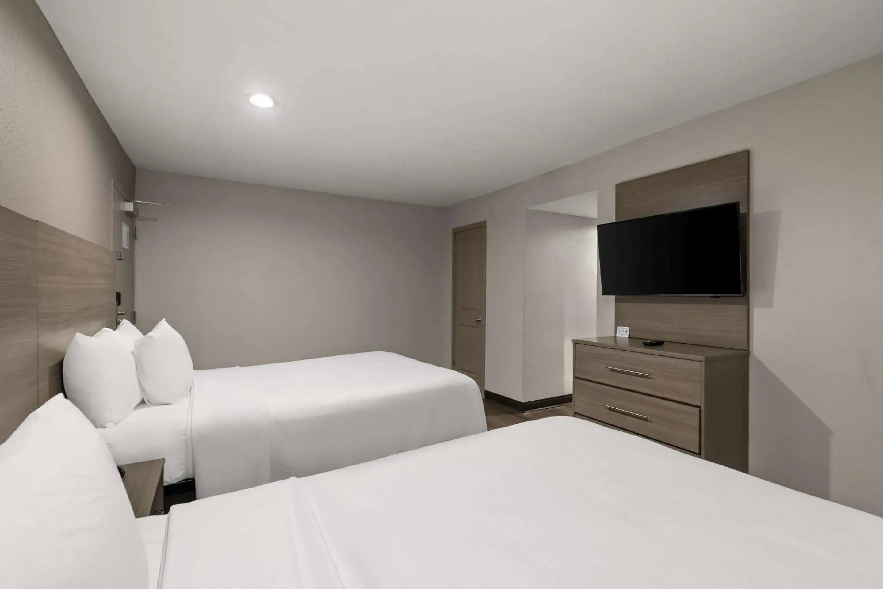 Bedroom, Bed in Quality Suites Wildwood - The Villages Bedroom, Bed in Quality Suites Wildwood - The Villages