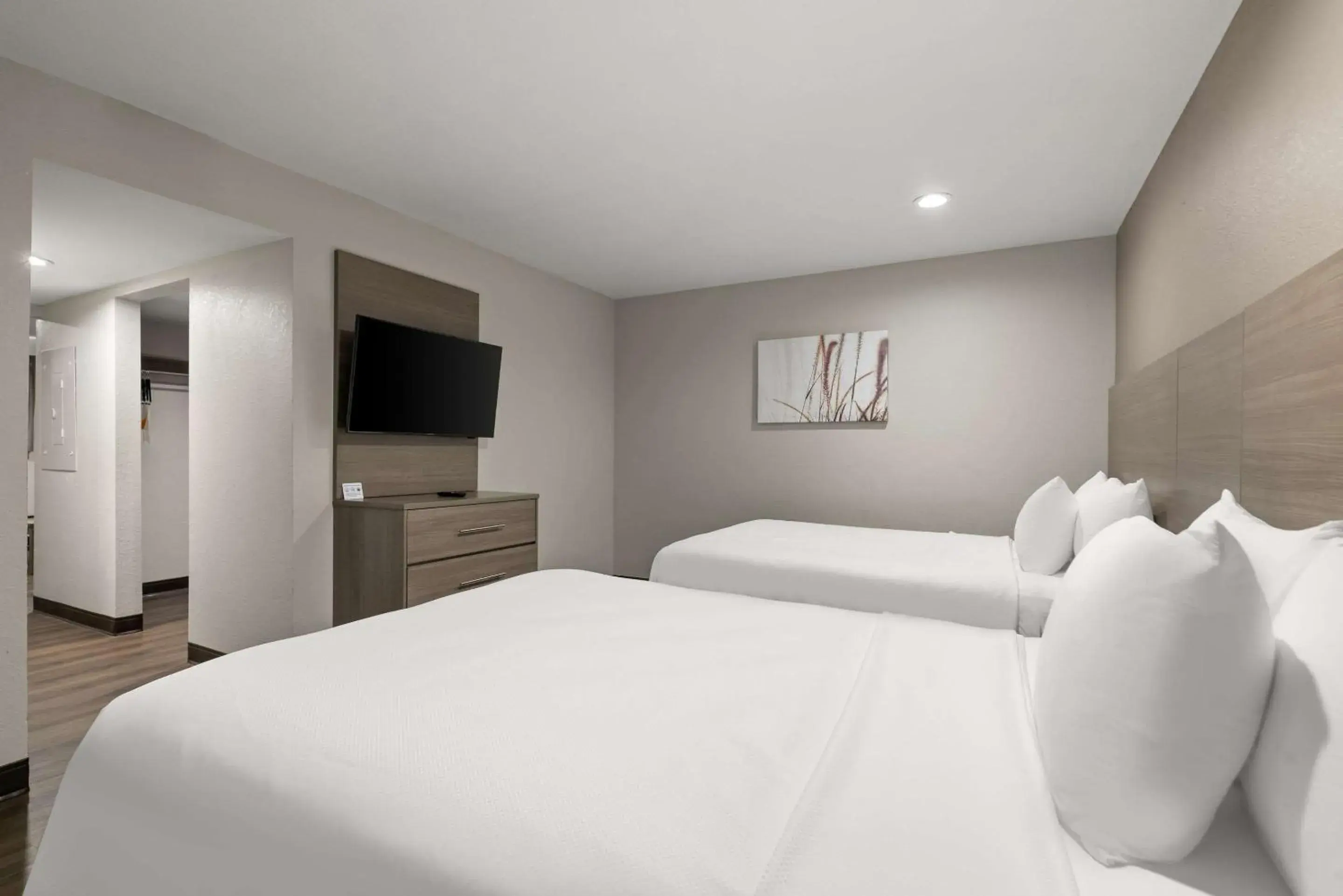 Bedroom, Bed in Quality Suites Wildwood - The Villages Bedroom, Bed in Quality Suites Wildwood - The Villages