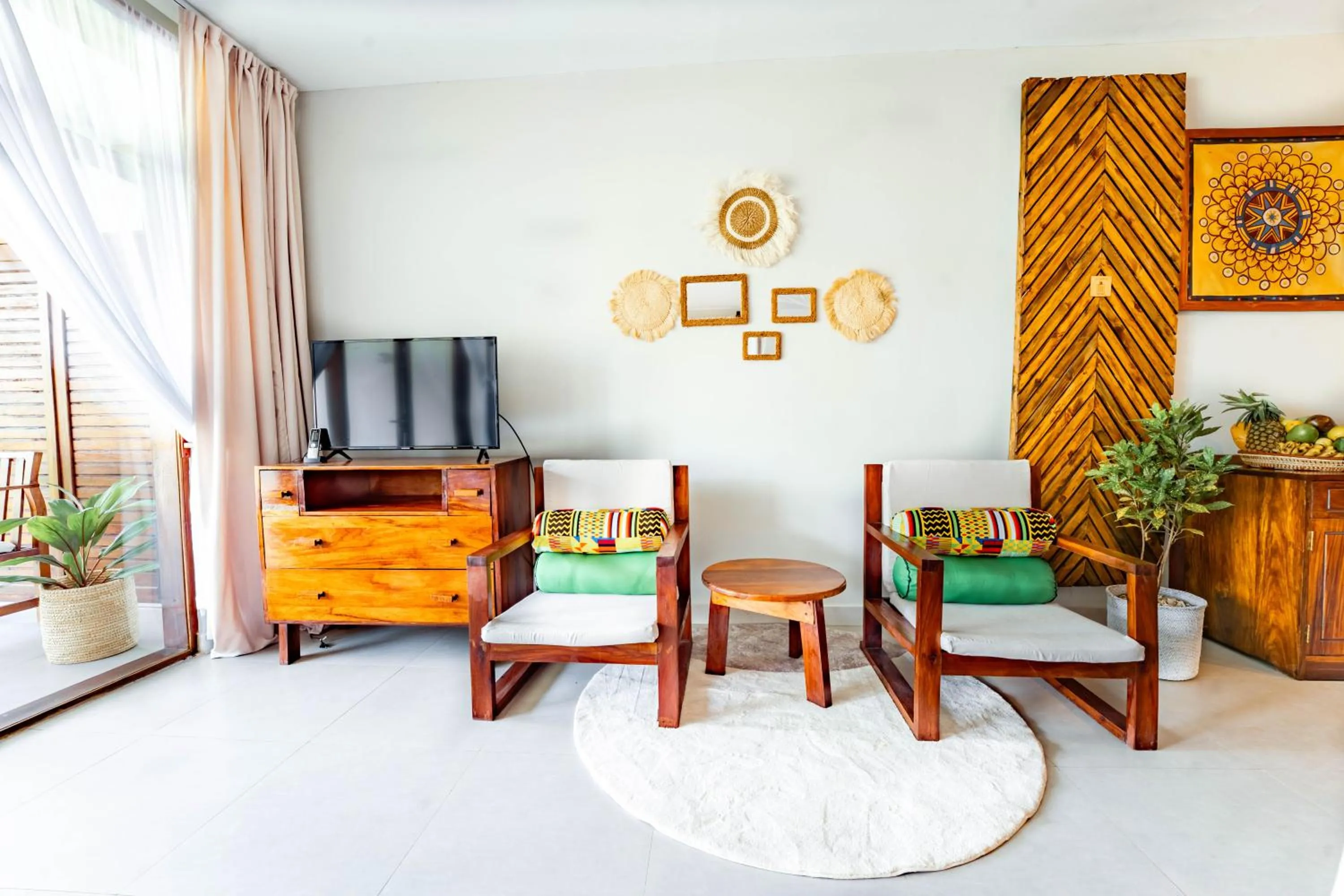Communal lounge/ TV room in Zanzibella Hotel & SPA