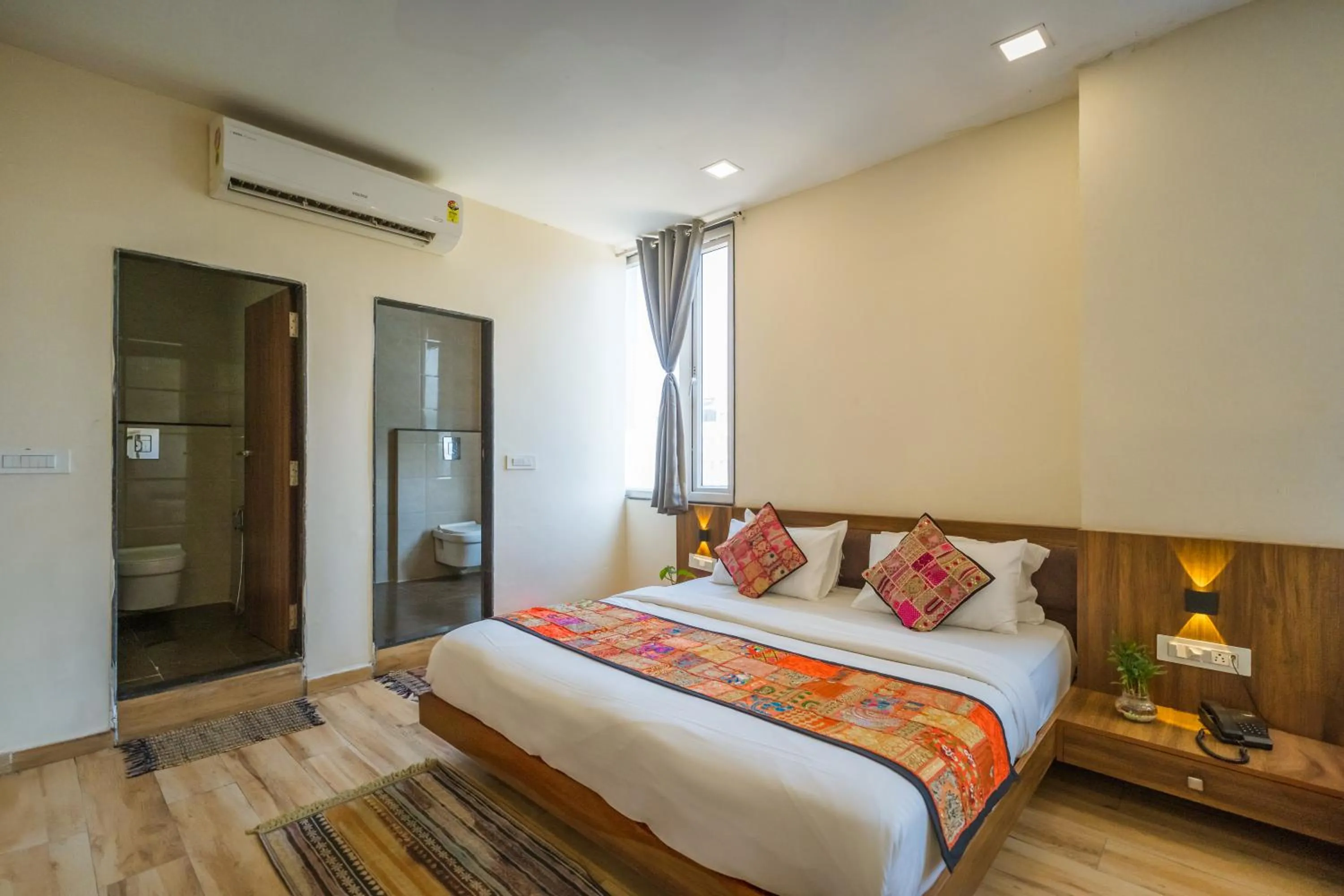 Bed in Tripli Hotels Le Shelton