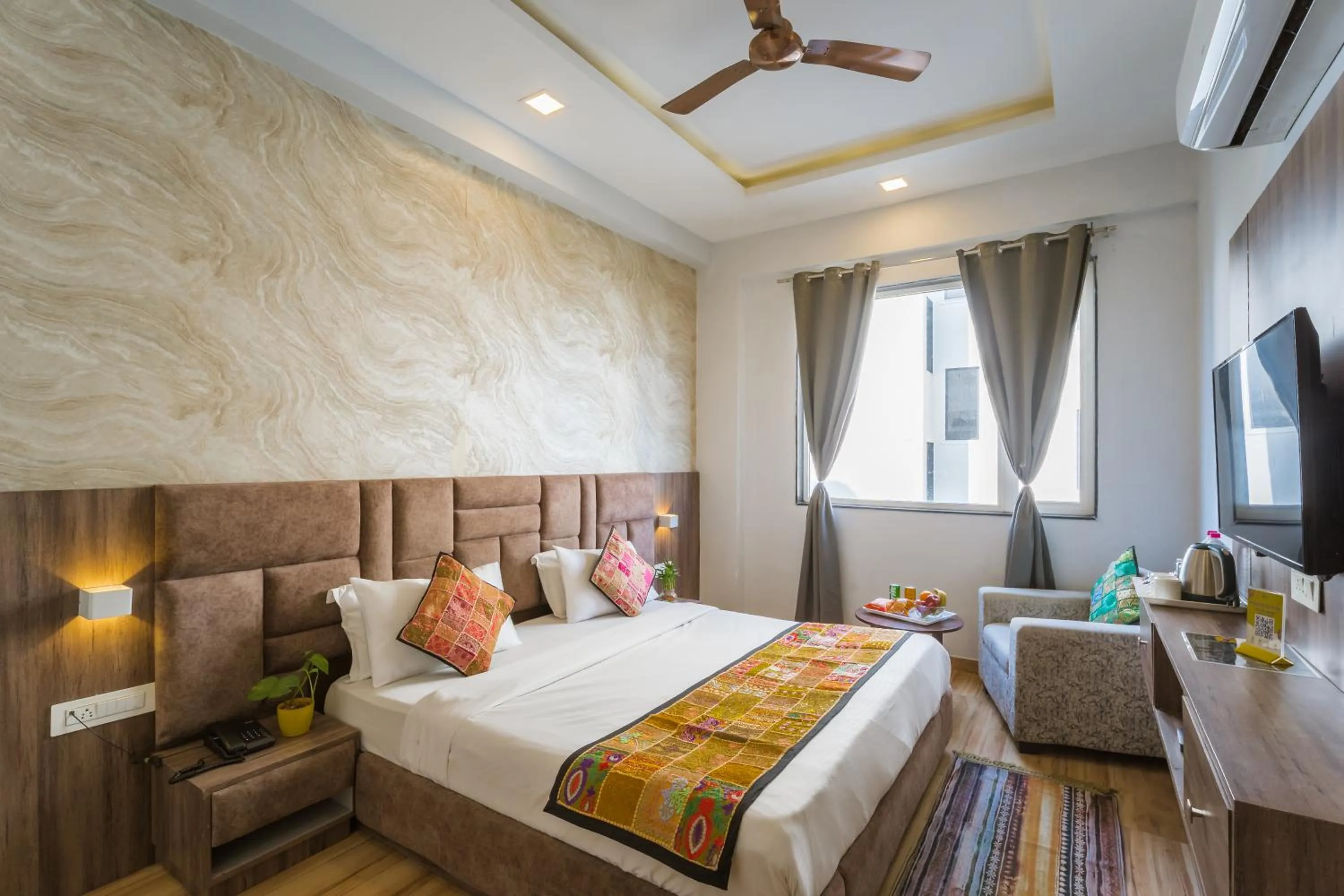 Bed in Tripli Hotels Le Shelton