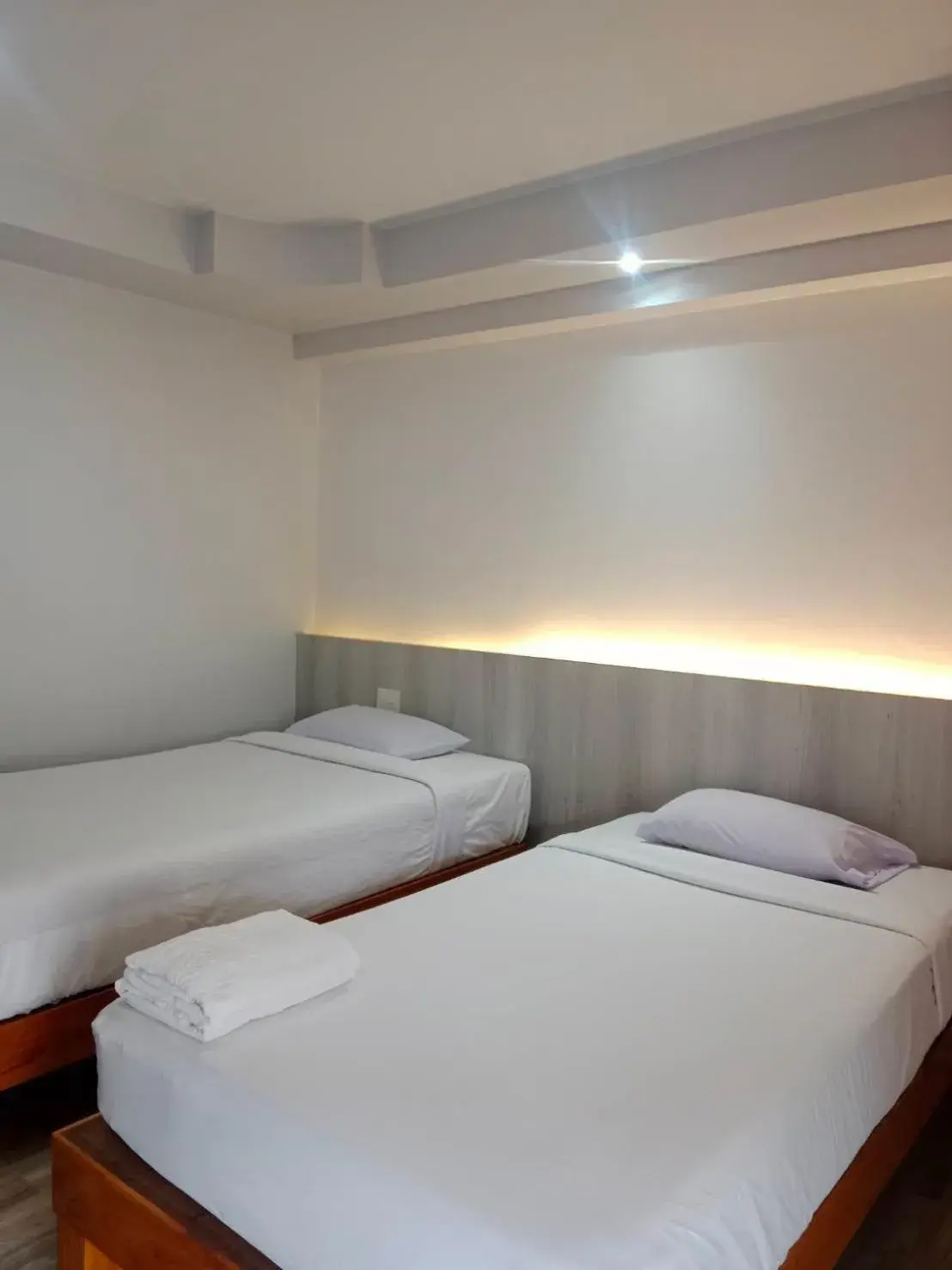 Bed in Kiatnakhon Hotel Bed in Kiatnakhon Hotel