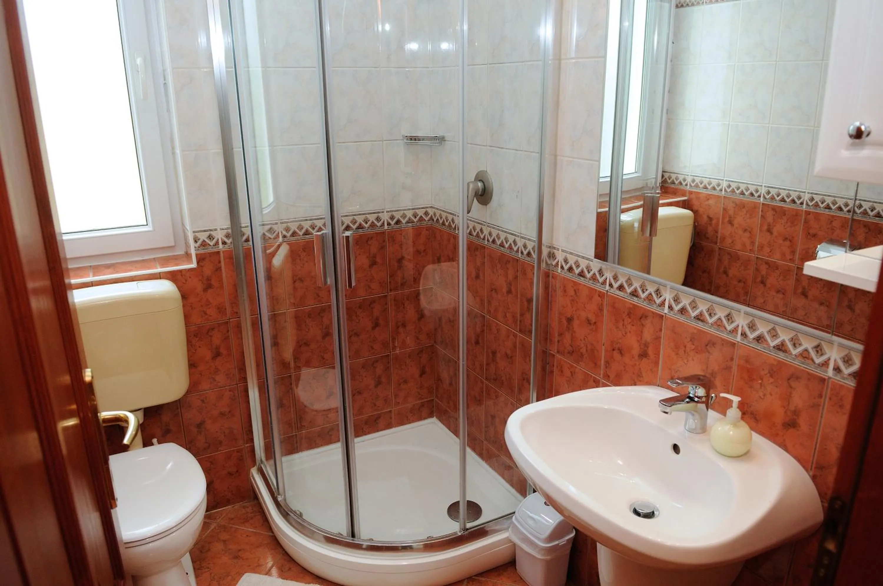 Bathroom in Apartman Bella Hotel