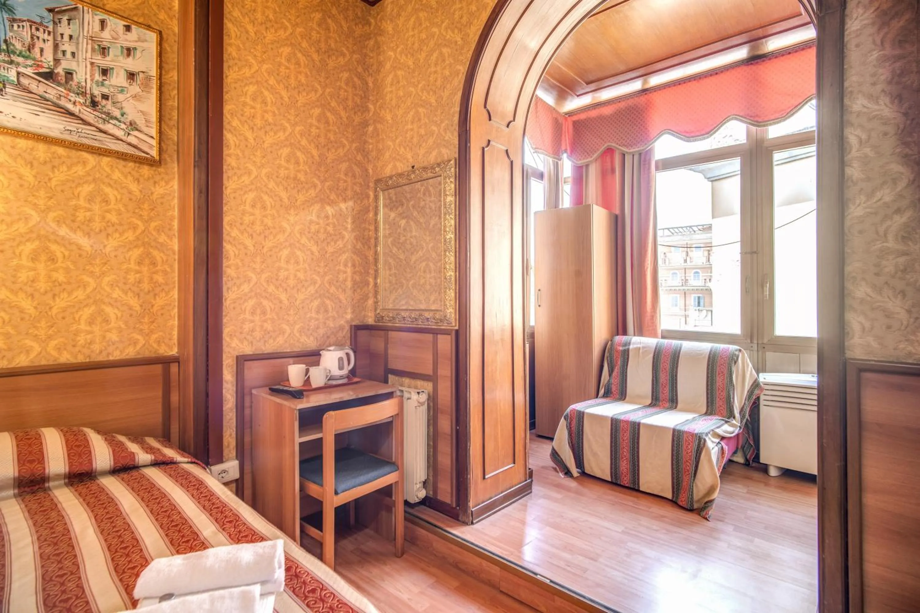 Seating area, Bed in Hotel Artromano