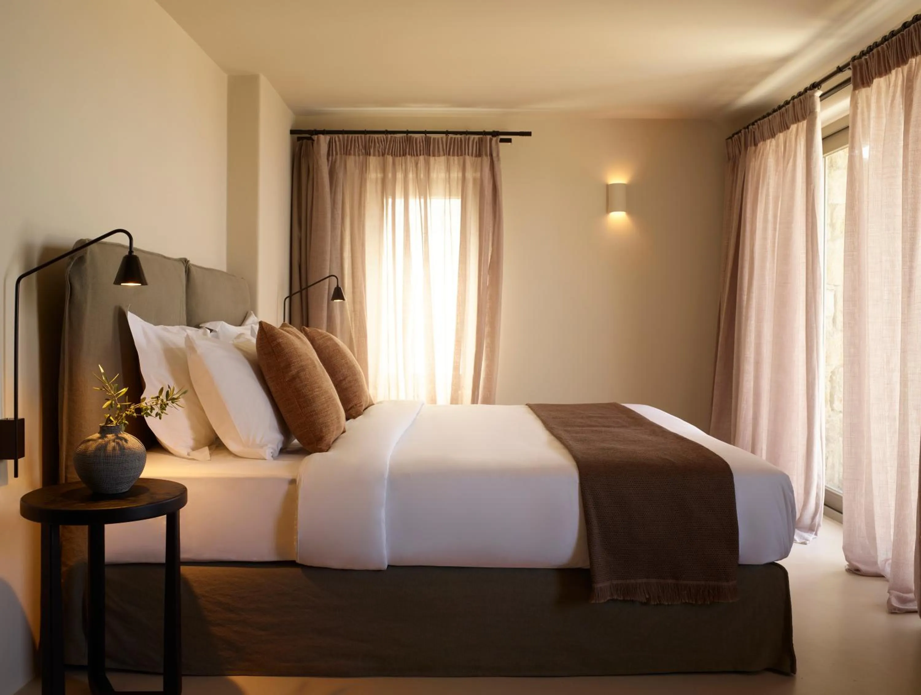 Bed in Collini Hotel Mykonos, WorldHotels Elite