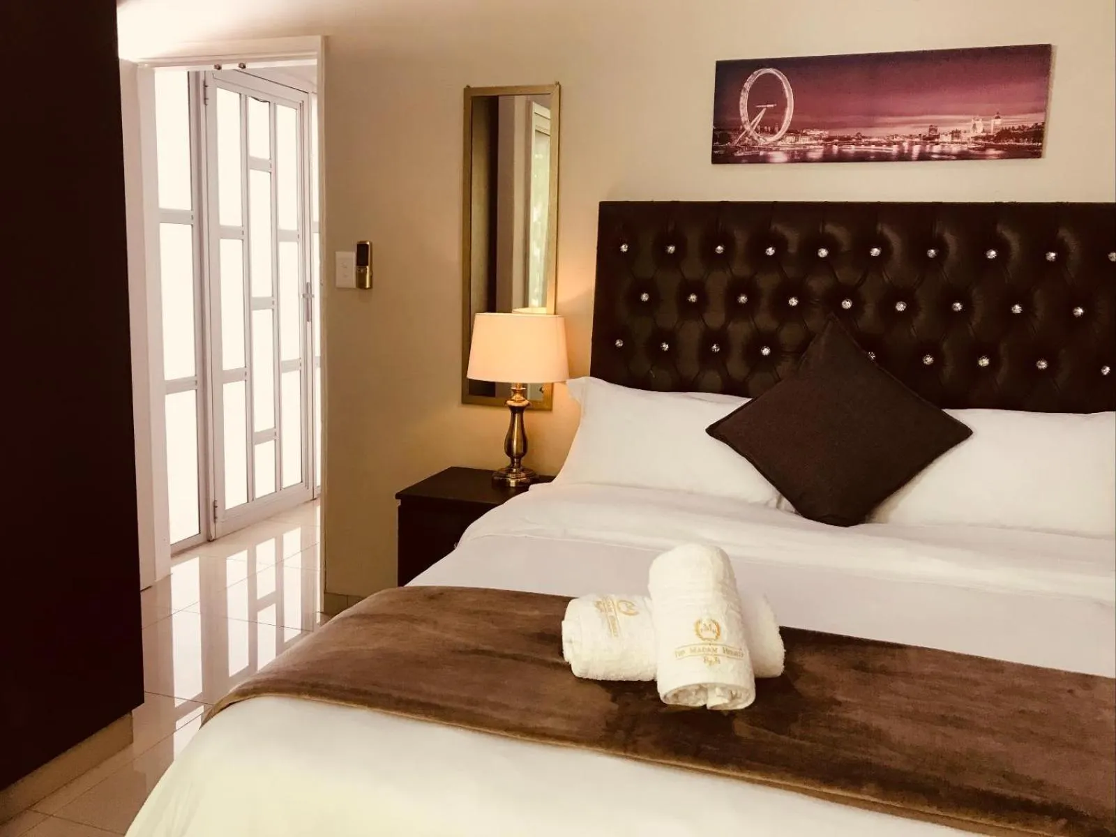 Bed in The Madam Herself B&B