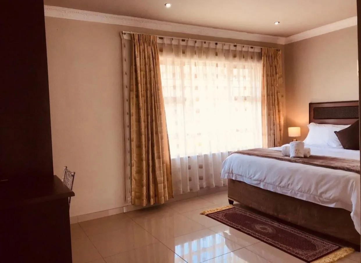 Bed in The Madam Herself B&B