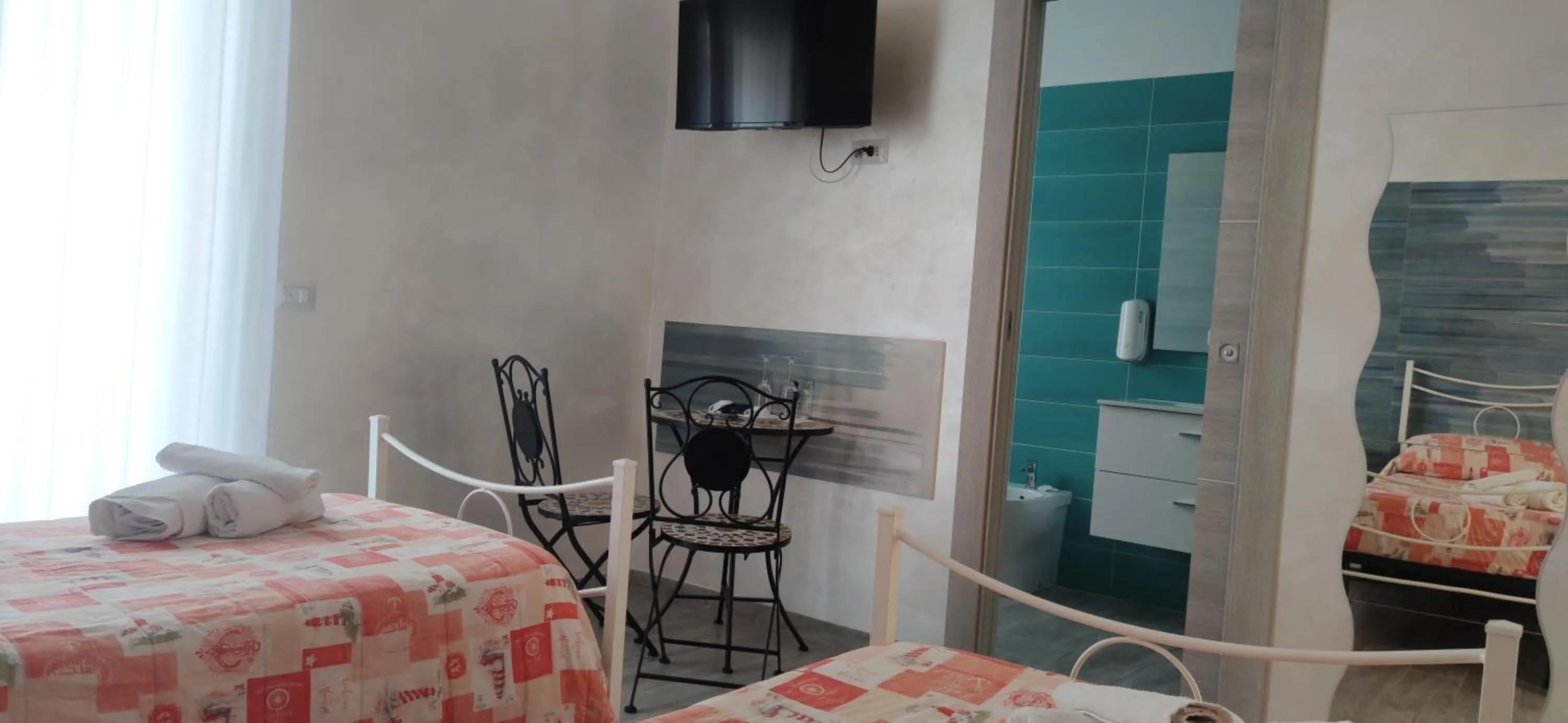 Bed in B & B LE GEMELLINE