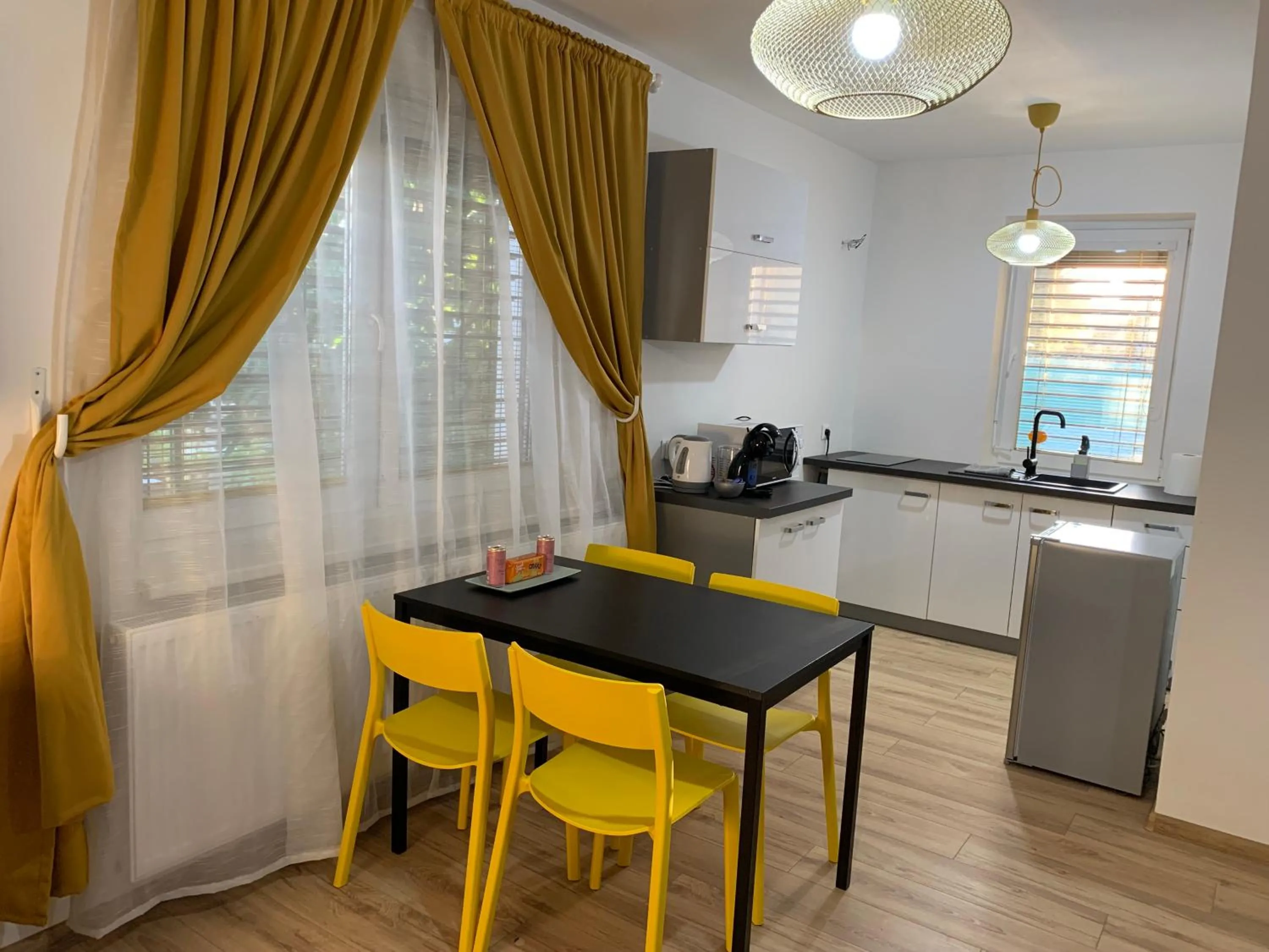 Kitchen or kitchenette in APARTMENTS TRENČÍN -Free Parking-