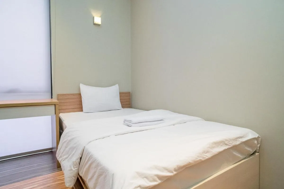 Bed in Three J Residence