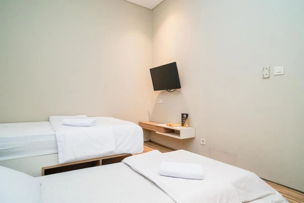 Bed in Three J Residence