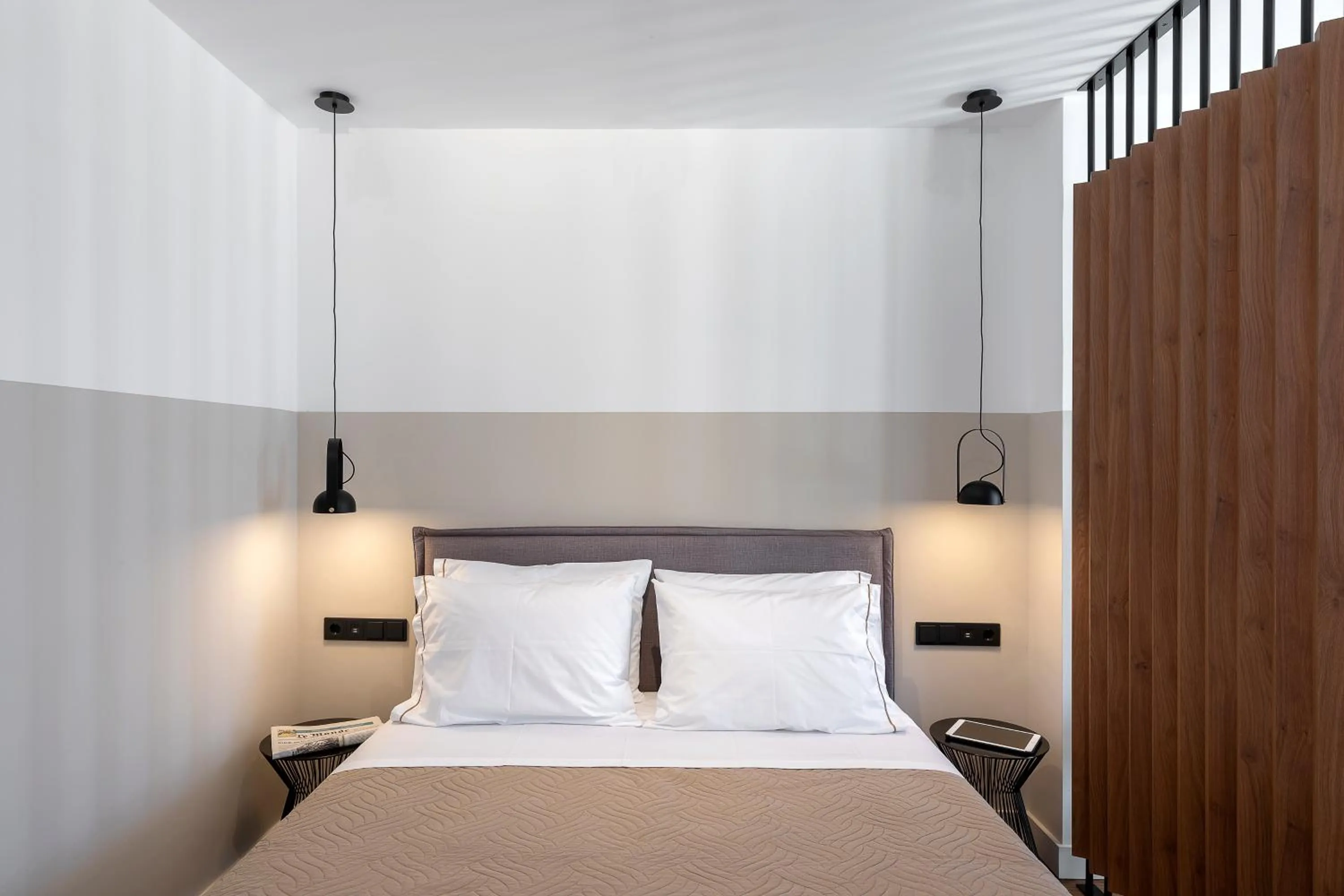 Bed in The Athenians Art Apartments