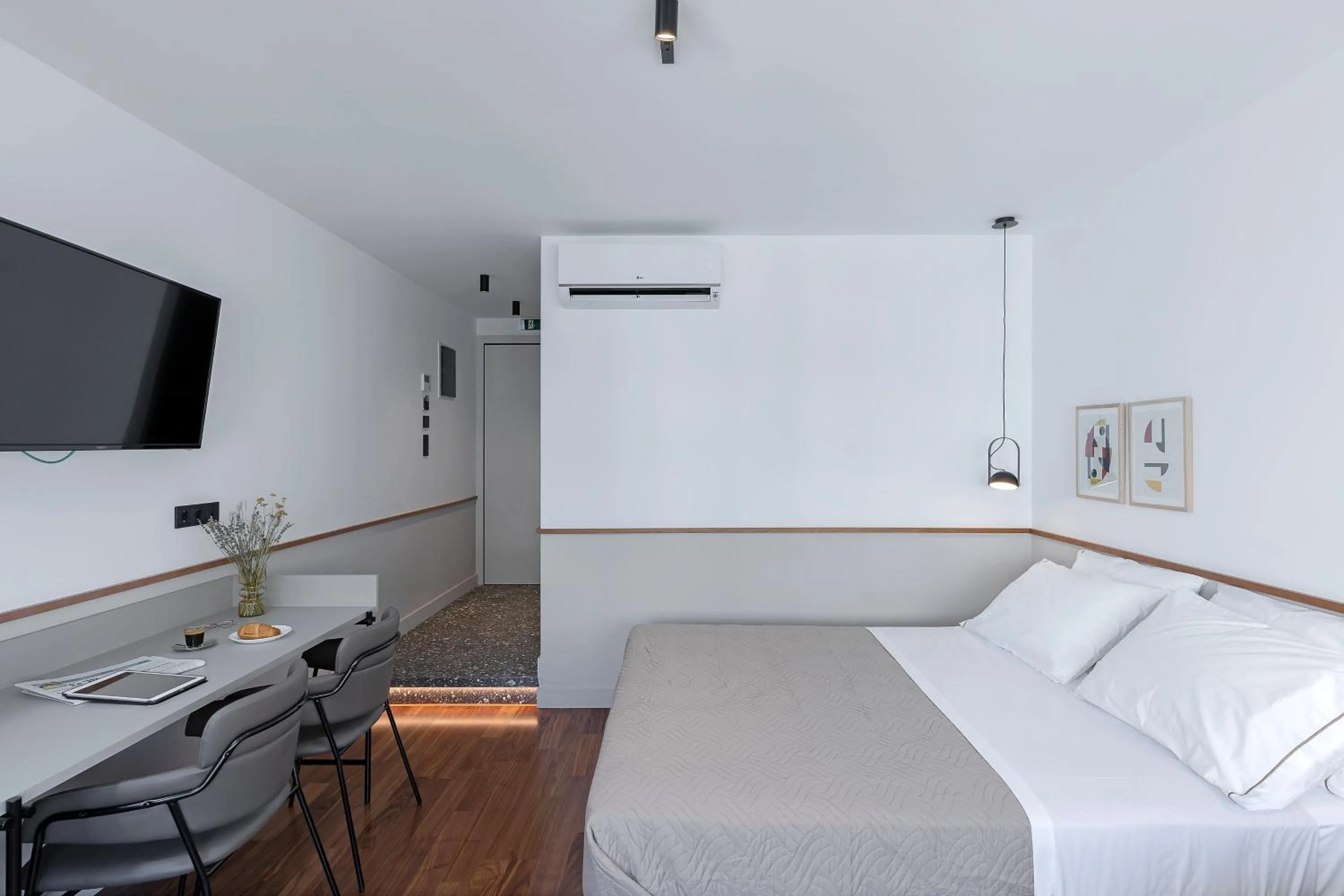 Bed in The Athenians Art Apartments