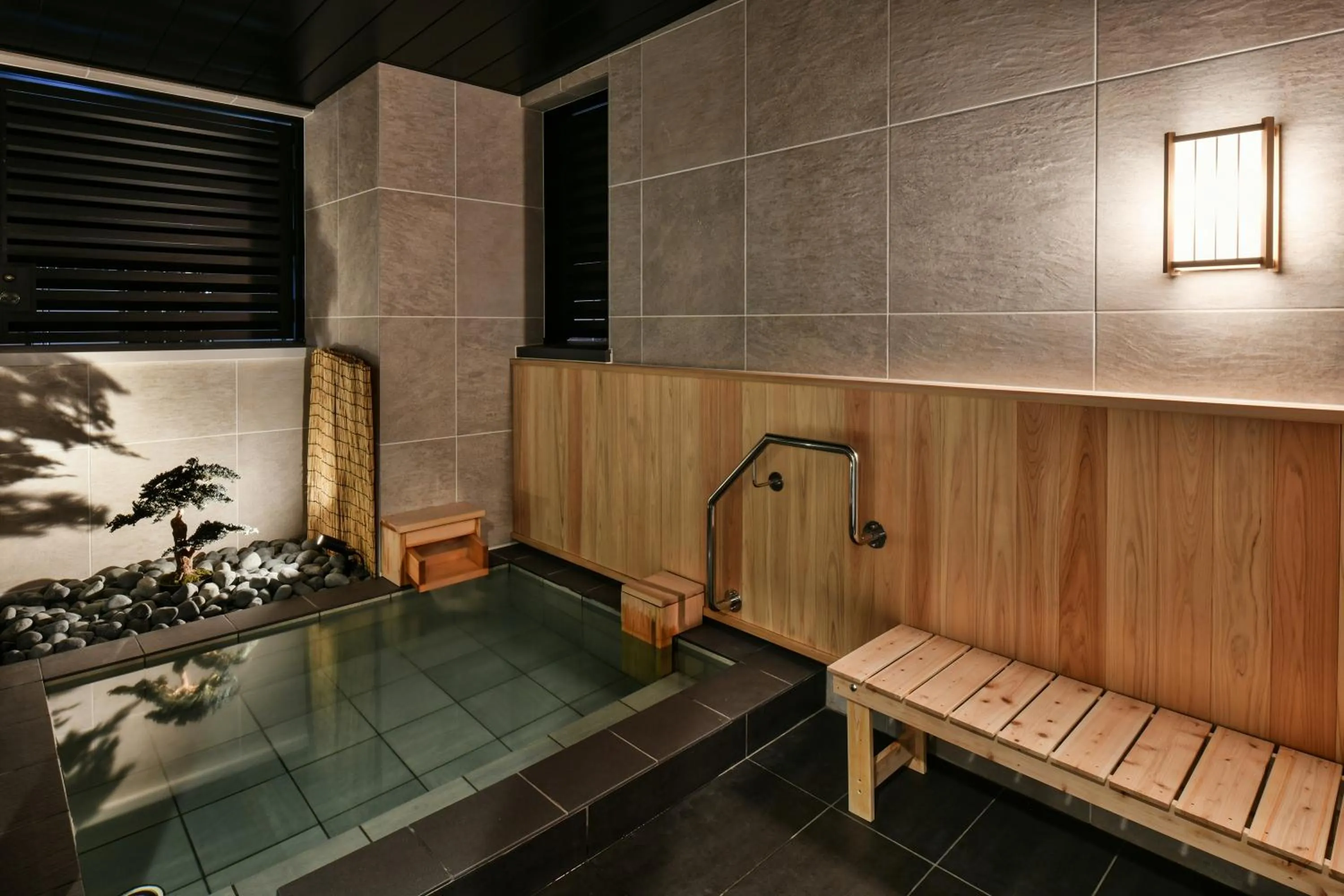 Public Bath in REF Matsuyama City Station by VESSEL HOTELS